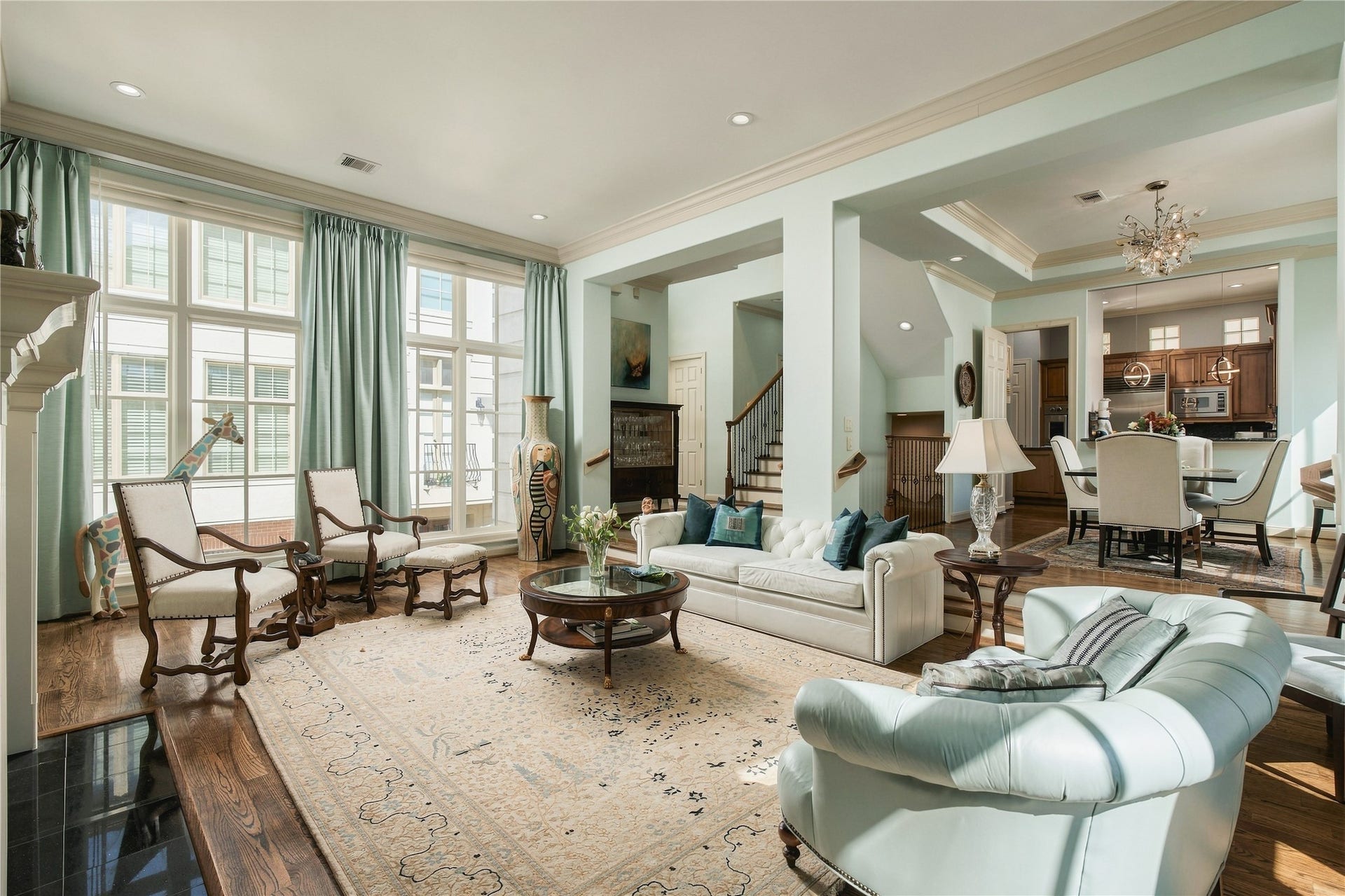 523 Lovett Boulevard, Houston, TX 77006 Turn around and the second floor begins to reveal how it all connects, with long sightlines carrying from the living room through dining and into the kitchen.