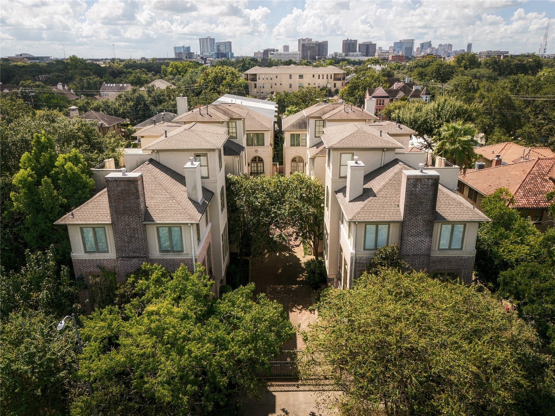 523 Lovett Boulevard, Houston, TX 77006 Aerial view of the gated Lovett Gardens community, tucked into the surrounding Montrose neighborhood with the city beyond.