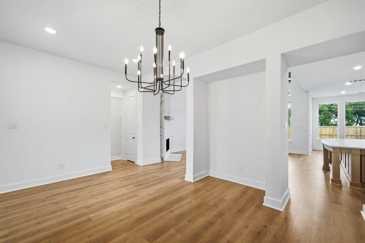 Open dining area conveniently located just off the foyer and adjacent to the main living spaces.