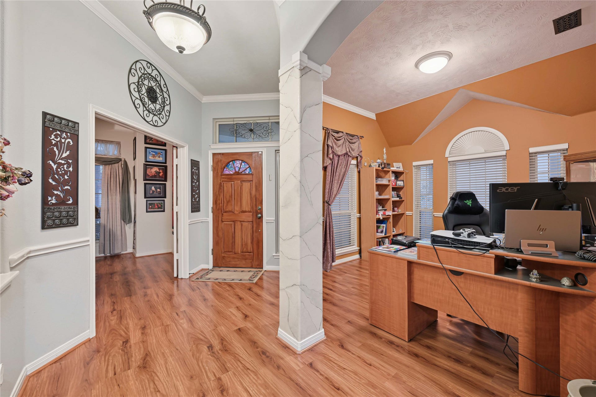 1918 Oakwood Court Drive, Baytown, TX 77521 Space on the right is formal dining room, which is now being used as an office area