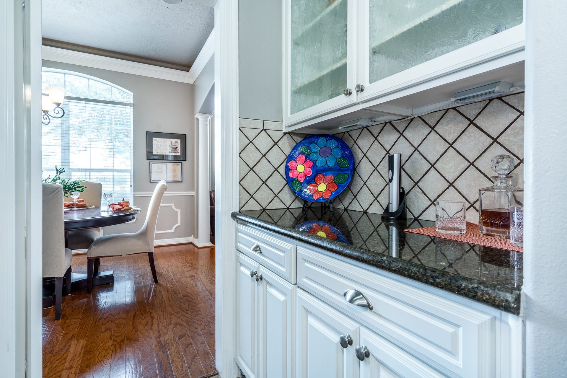 20303 Stone Lake Circle, Tomball, TX 77377 The butlers pantry leads to the formal dining room