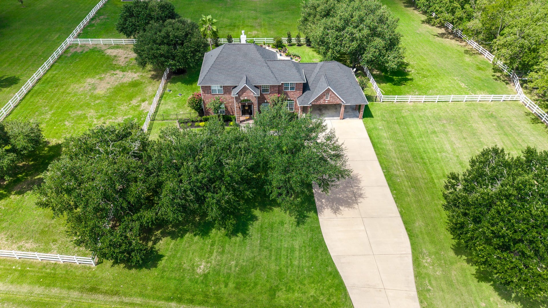 20303 Stone Lake Circle, Tomball, TX 77377 To the left is a secondary cross fenced pasture