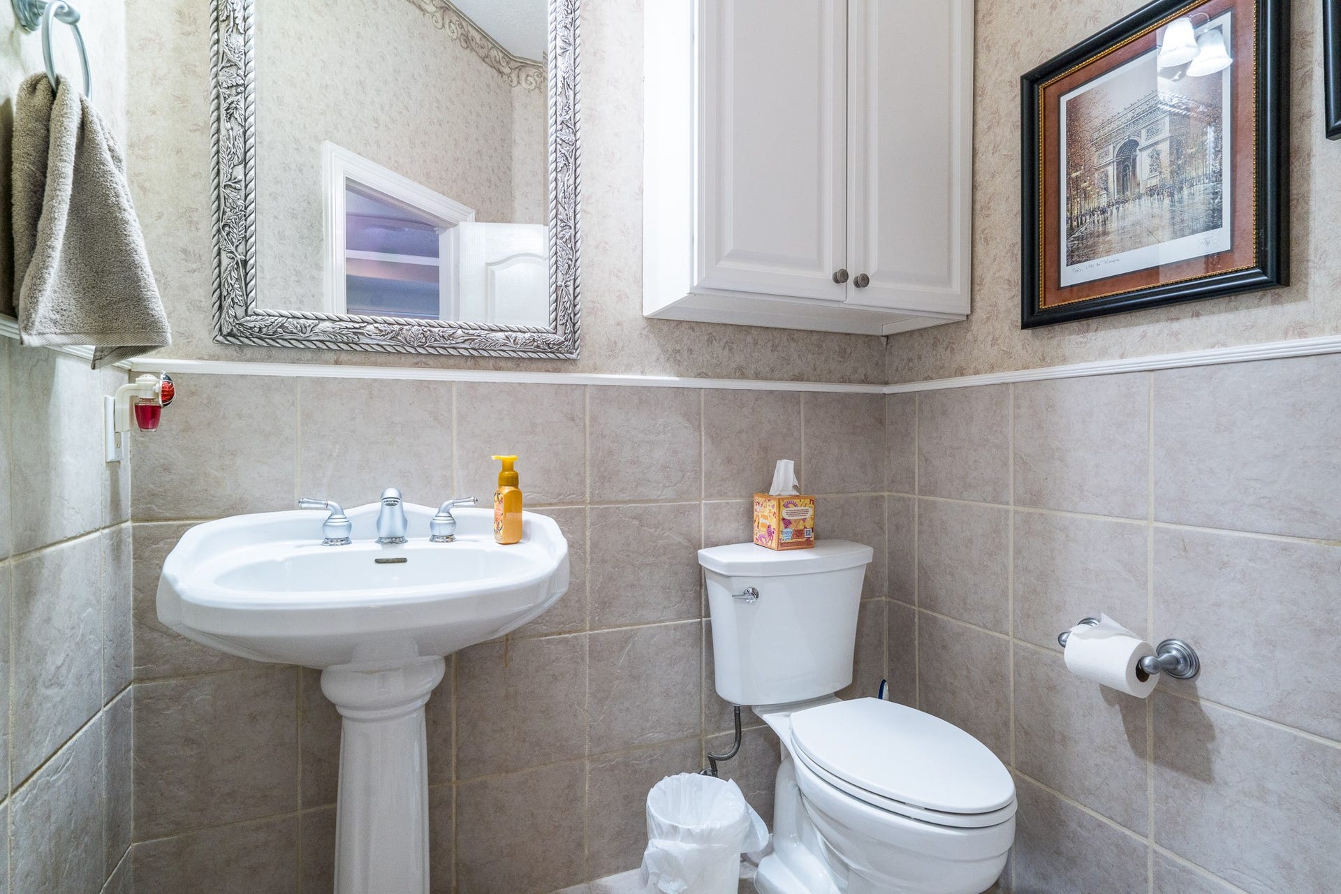 20303 Stone Lake Circle, Tomball, TX 77377 A powder bath is off the living room