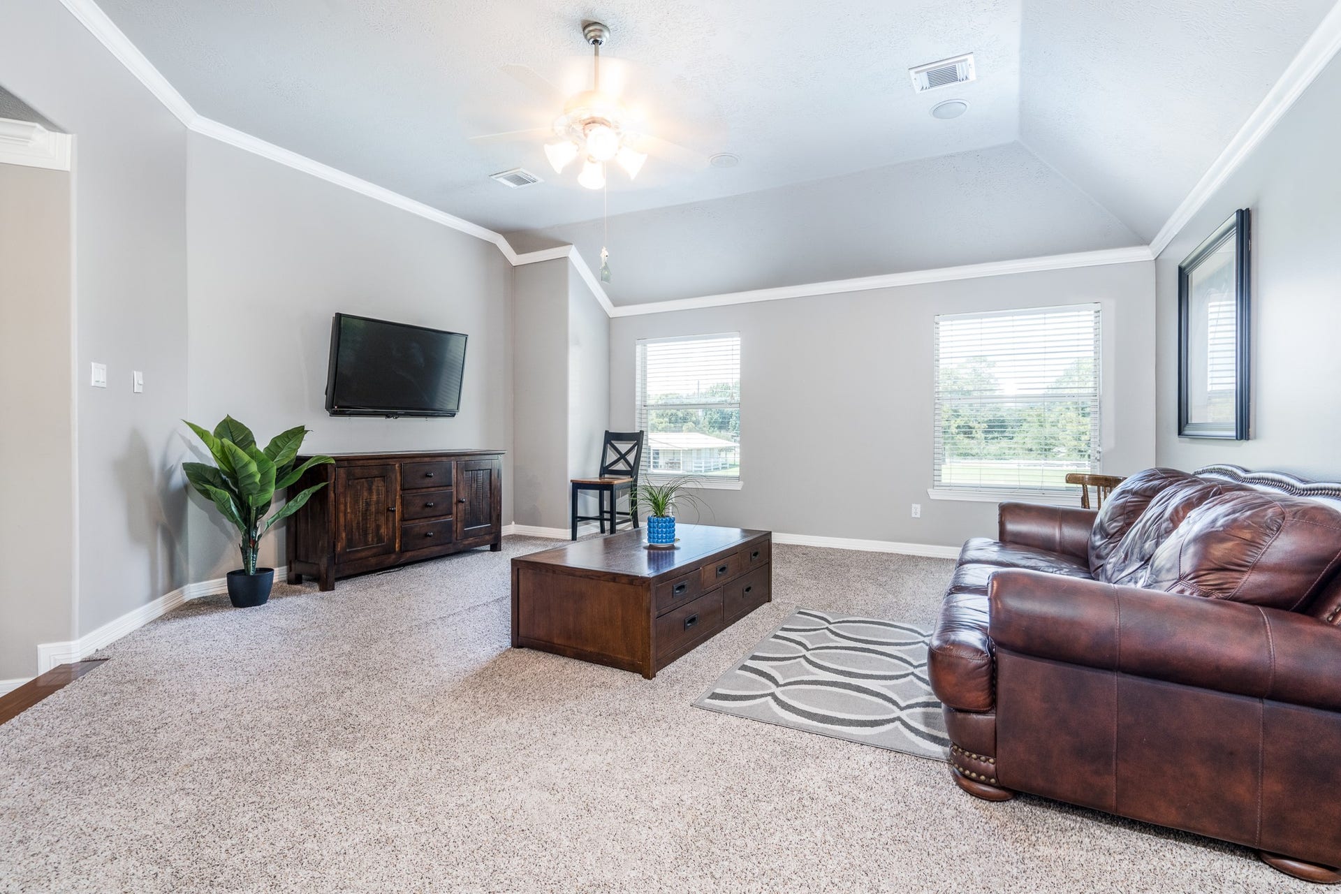 20303 Stone Lake Circle, Tomball, TX 77377 A spacious game room upstairs has plenty of space for a pool table or sectional sofa