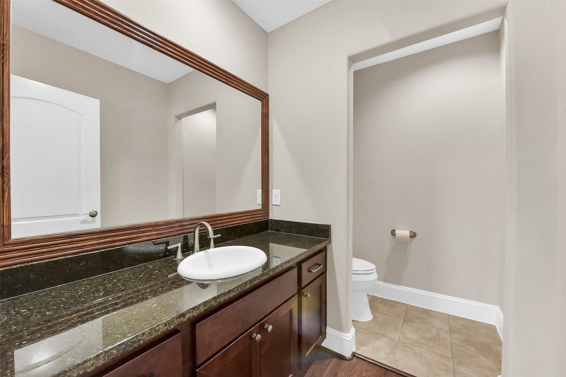 905 Garden Oaks Trace, Houston, TX 77018 There is also a half bathroom located on the second level.