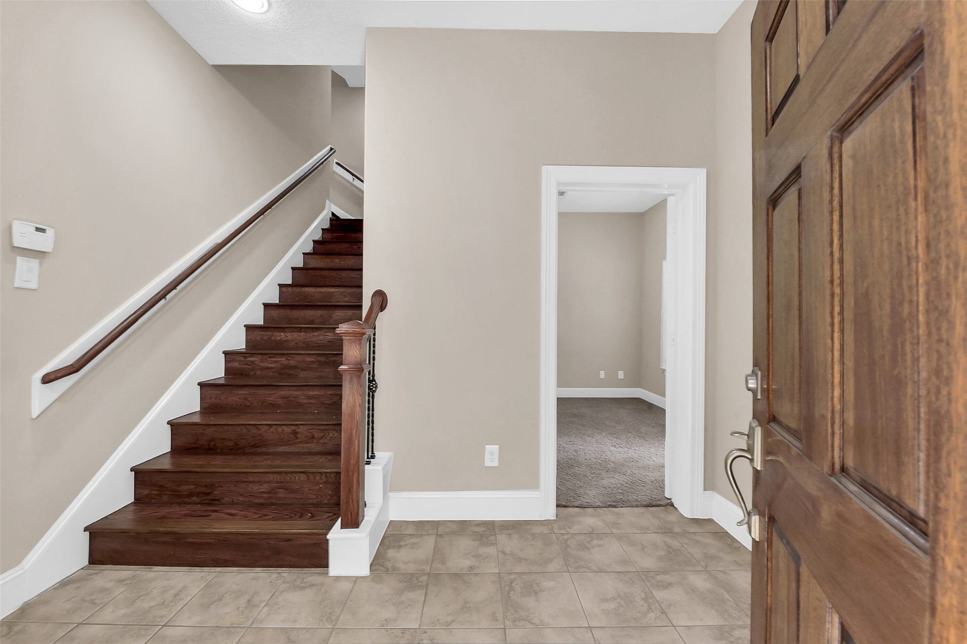 905 Garden Oaks Trace, Houston, TX 77018 Follow the wood lined stairs to the second level where the family room, kitchen and dining area is located.