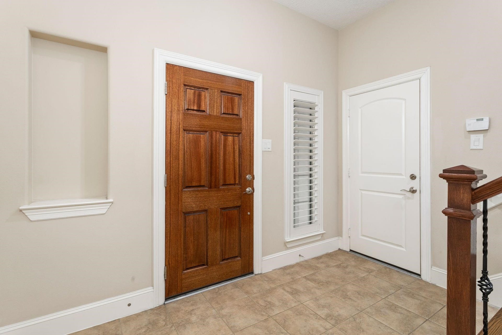 905 Garden Oaks Trace, Houston, TX 77018 Enter the tile covered entry area of your new home.