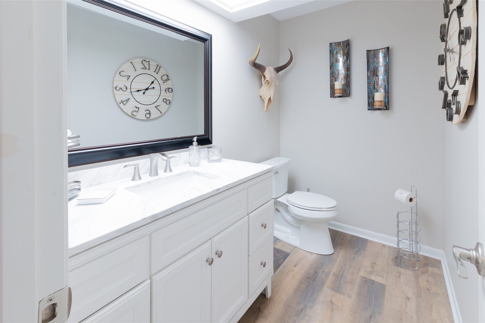 beautiful spacious half bath between kitchen garage
