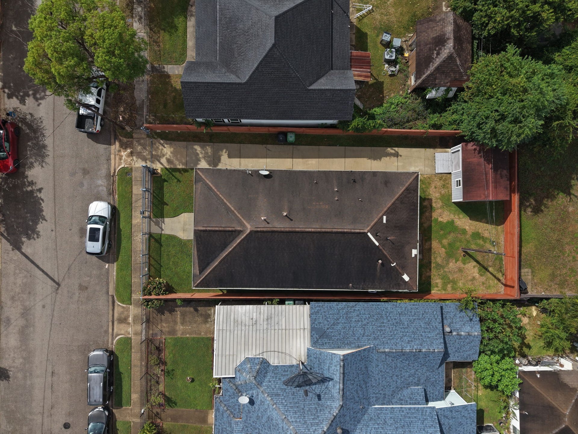 1917 Chapman Street, Houston, TX 77009 Aerial view of the property highlighting the spacious backyard and the detached workshop/shed.