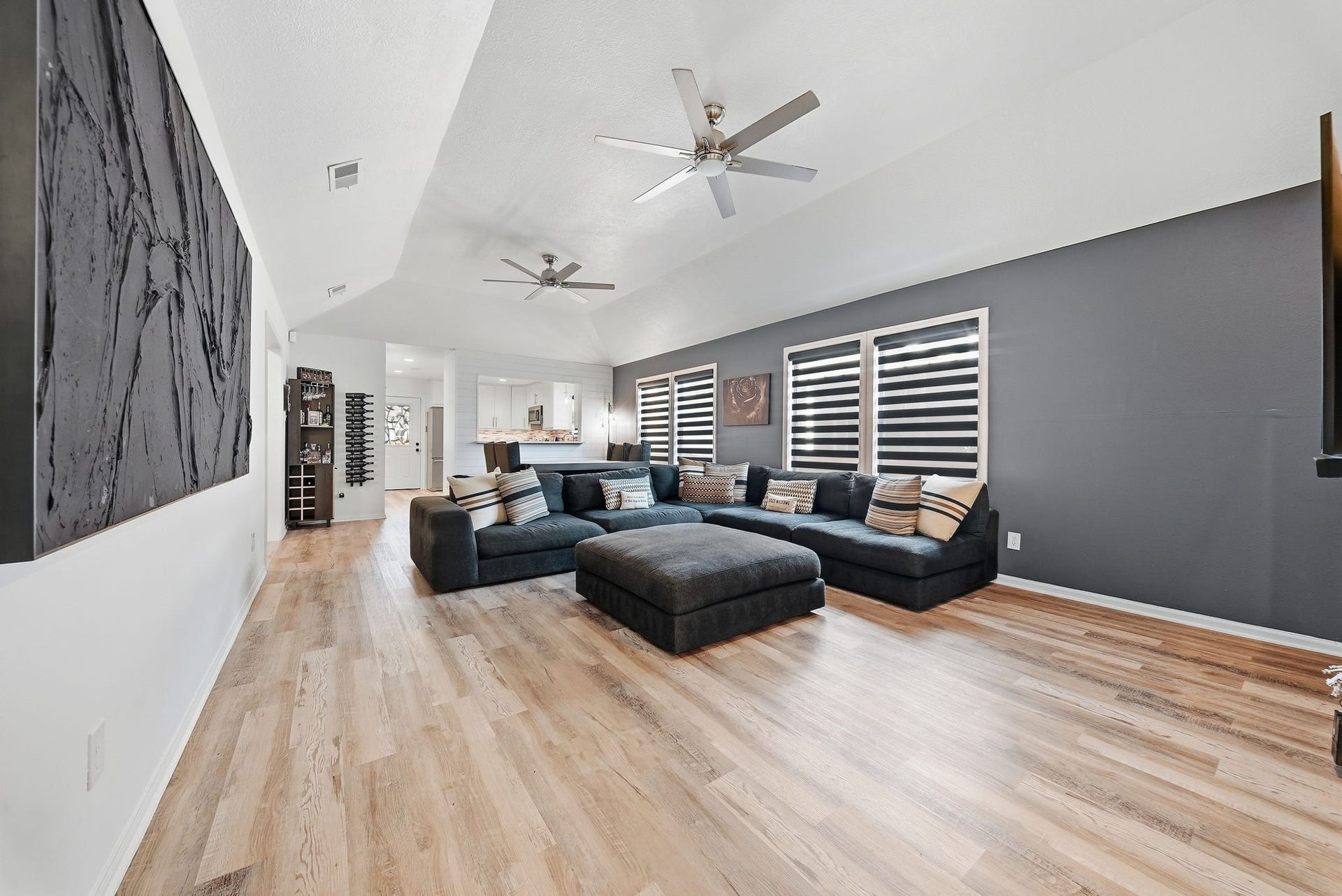 1917 Chapman Street, Houston, TX 77009 Spacious, light-filled living area featuring an open floor plan that is perfect for entertaining guests.