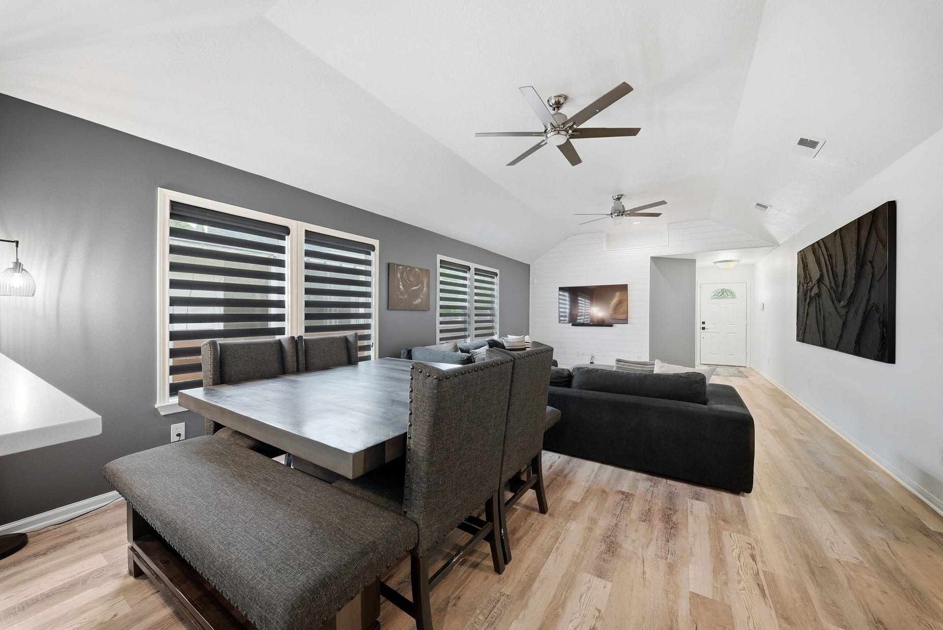 1917 Chapman Street, Houston, TX 77009 Open-concept living and dining area featuring high ceilings.