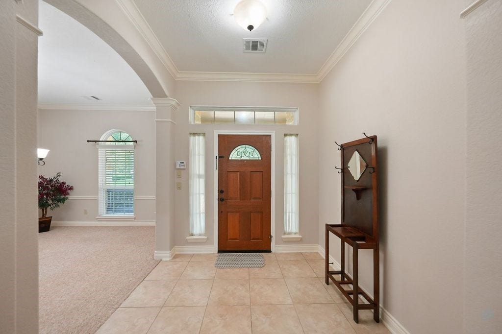 28235 Lazy Rock Drive, Houston, TX 77336 Foyer with access to formal dining