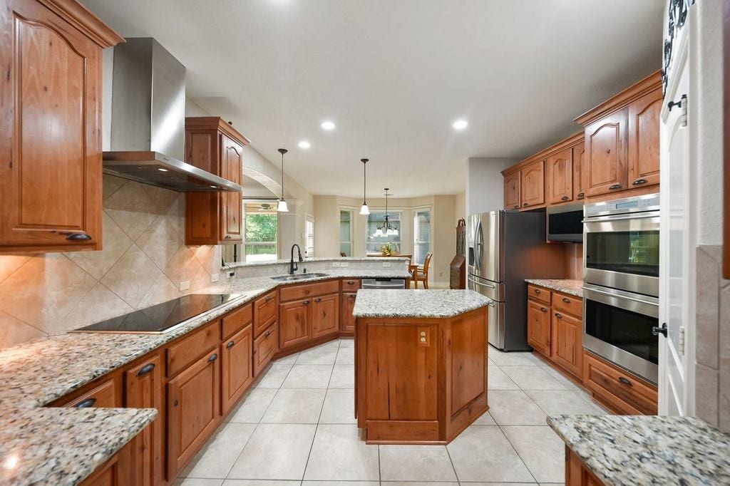 28235 Lazy Rock Drive, Houston, TX 77336 Great workspace with island and high-end appliances