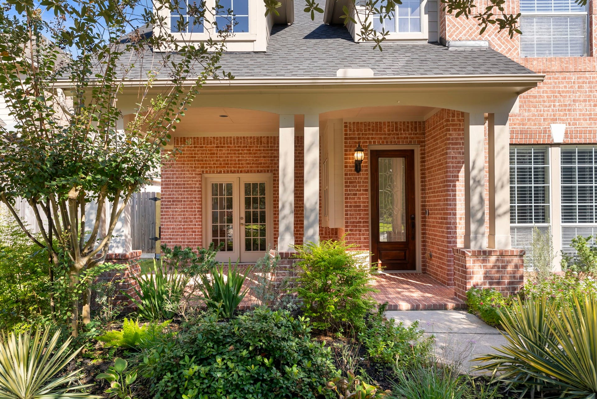 Inviting entrance with a spacious front porch.
