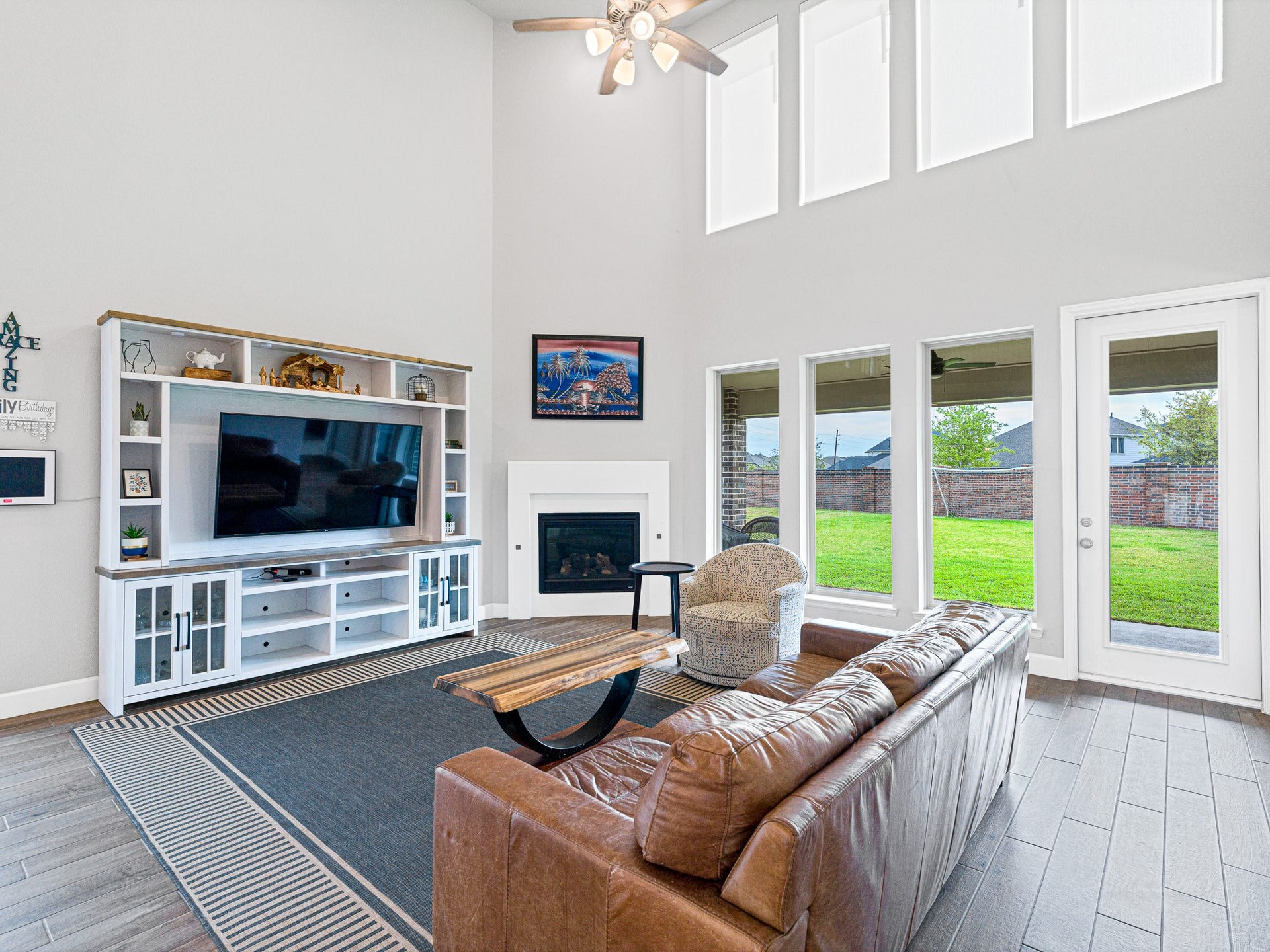 608 Malibu Pines Drive, Katy, TX 77493 This property is BETTER THAN NEW with added walk-in attic storage, water softener, built-in office cabinetry, gutters, remote controlled window shades, security cameras, ceiling fans. matte black faucets, and more!