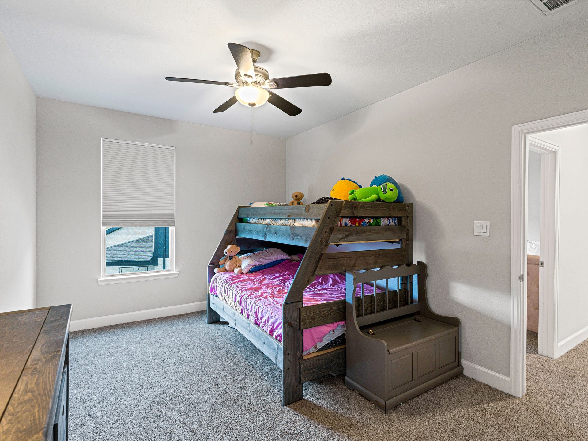 608 Malibu Pines Drive, Katy, TX 77493 Spacious secondary bedroom with ceiling fan, blinds, and walk-in closet