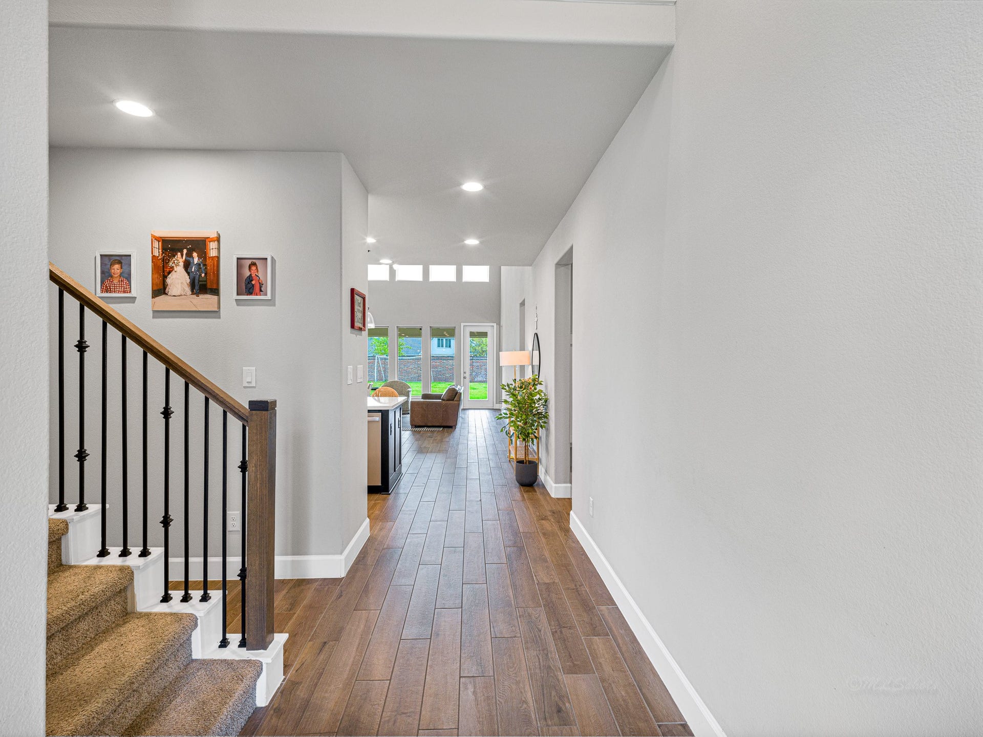 608 Malibu Pines Drive, Katy, TX 77493 Upon entry, notice the wood-look tile flooring and abundant natural light.