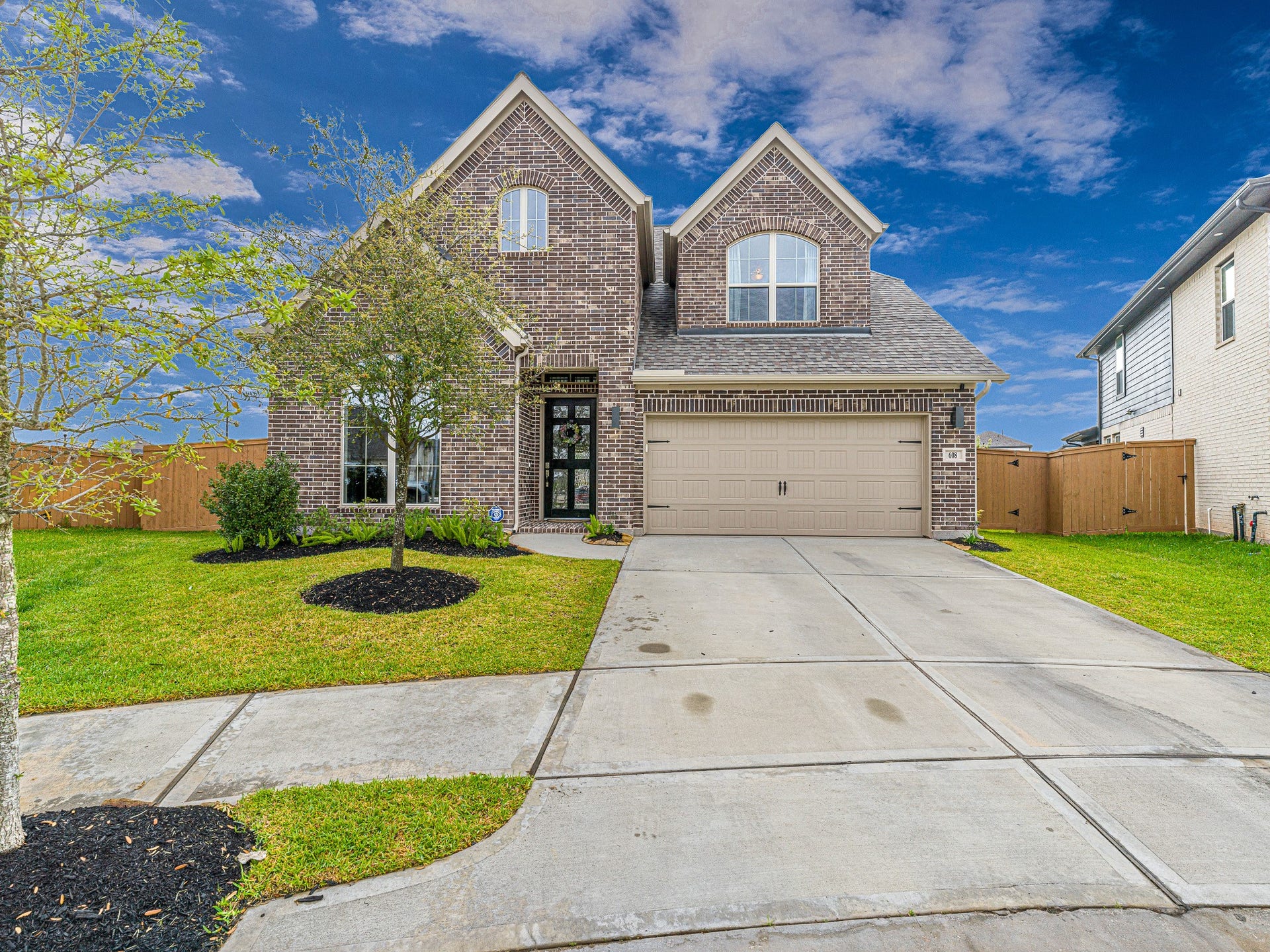 608 Malibu Pines Drive, Katy, TX 77493 Located in half cul-de-sac in small gated section.