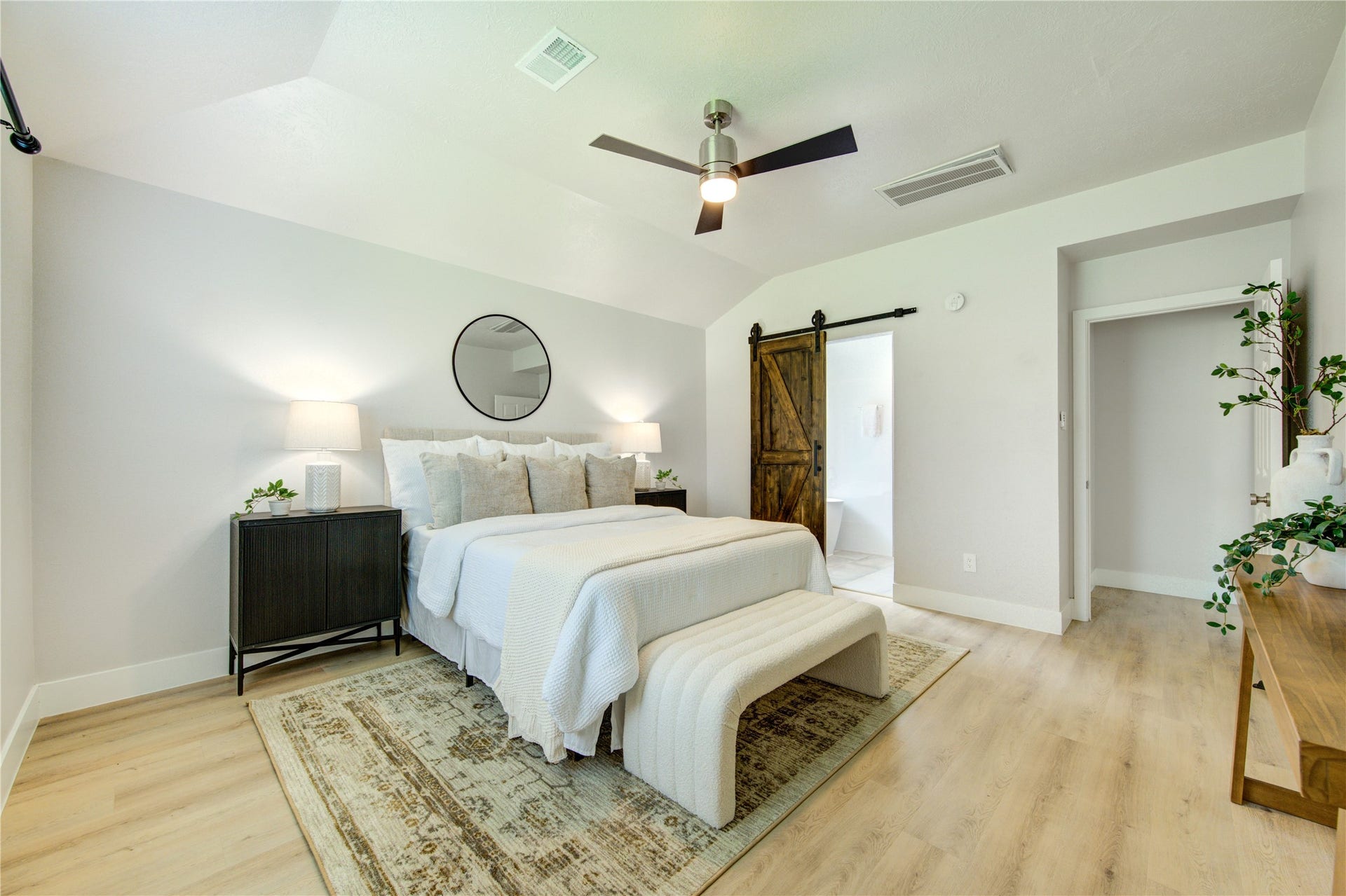 4931 Lake Catherine Court, Richmond, TX 77407 Barn door separates Primary Bed from Bath