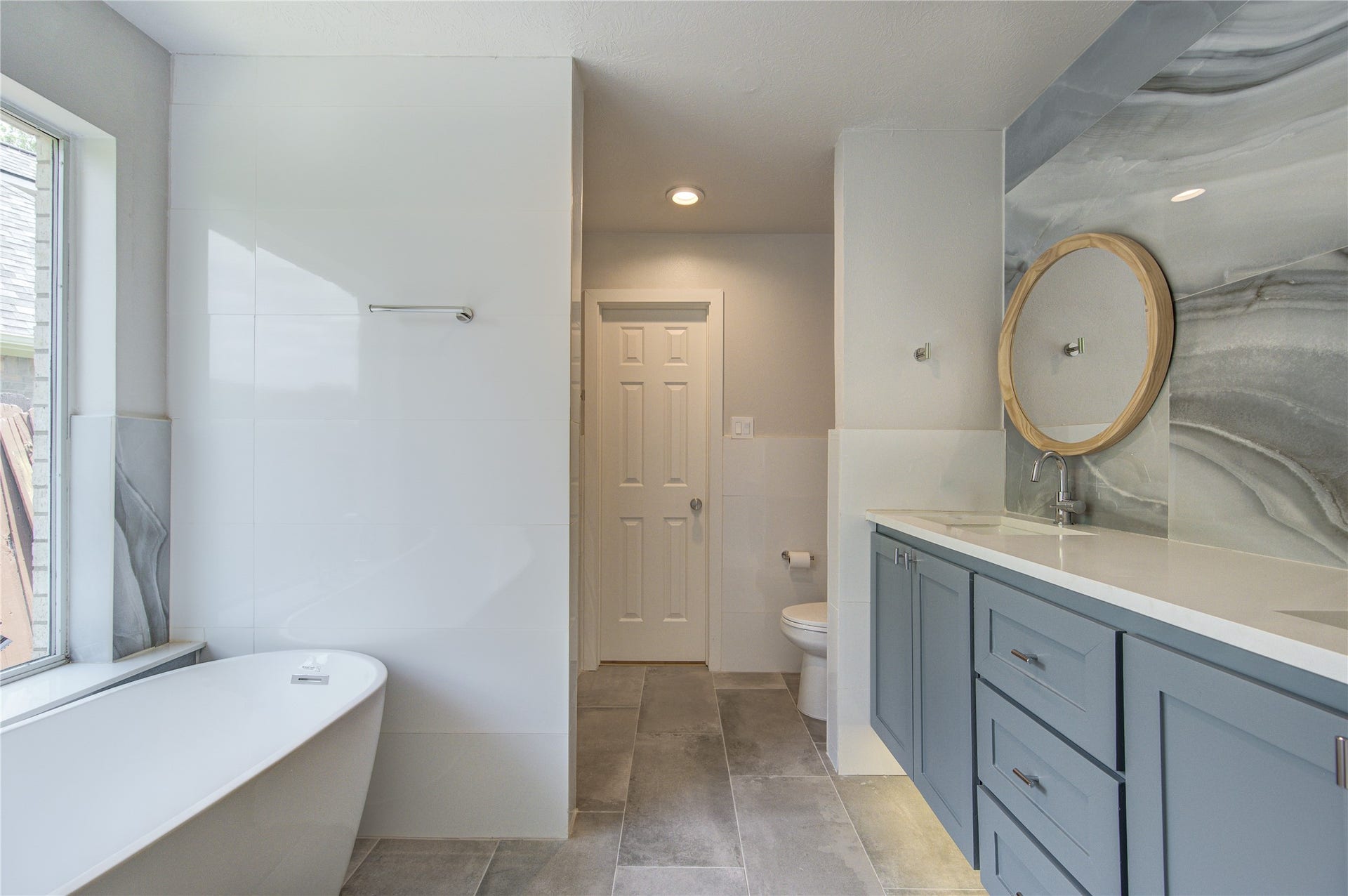 4931 Lake Catherine Court, Richmond, TX 77407 Primary Bath features floating cabinets with under cabinet LED lighting