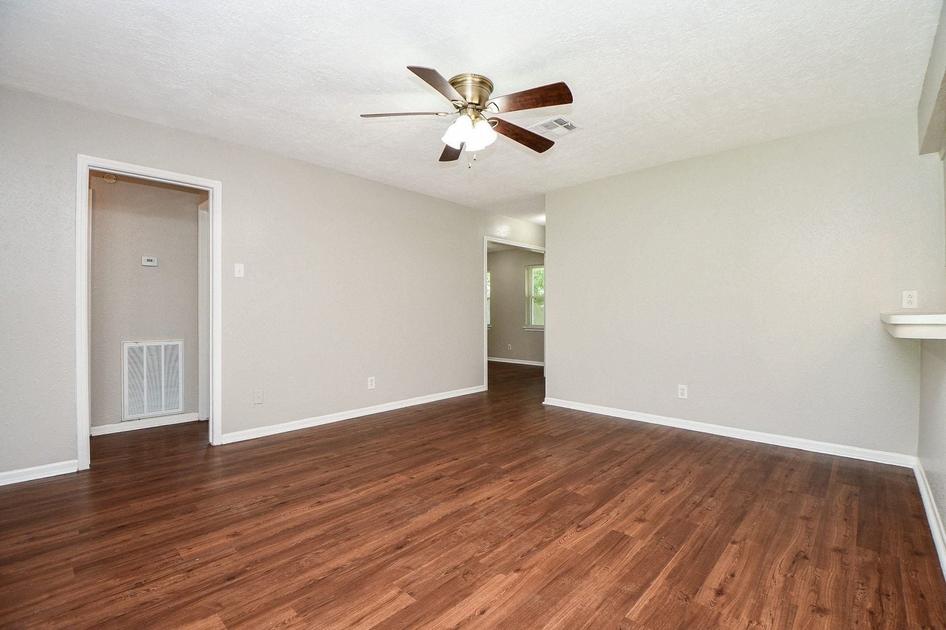922 Bacliff Drive, Bacliff, TX 77518 Rich, new laminate flooring adds warmth and durability to the living space, creating a welcoming flow throughout the home.