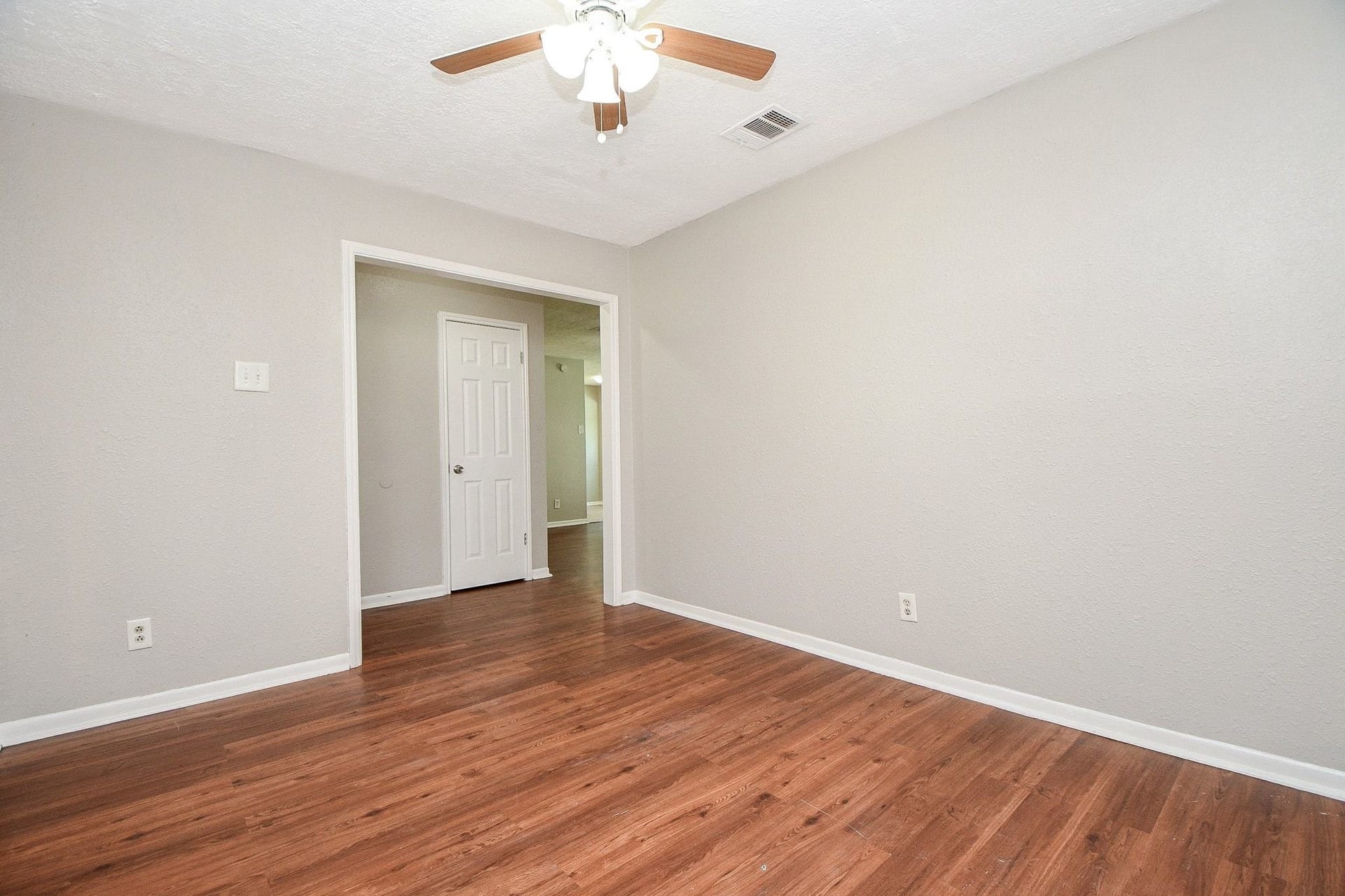 922 Bacliff Drive, Bacliff, TX 77518 Flex Room with an entryway coat closet being shown in the hall leading to the main living area.