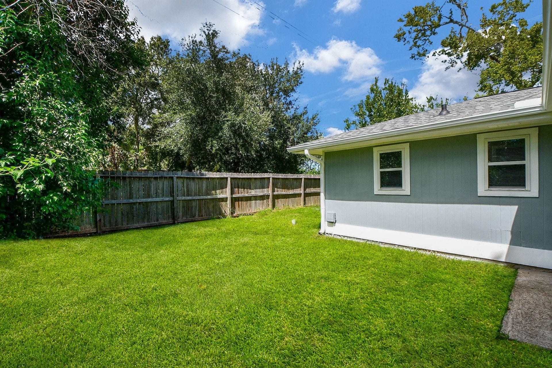 922 Bacliff Drive, Bacliff, TX 77518 Fenced yard provides plenty of privacy and open green space for whatever you needs may be.