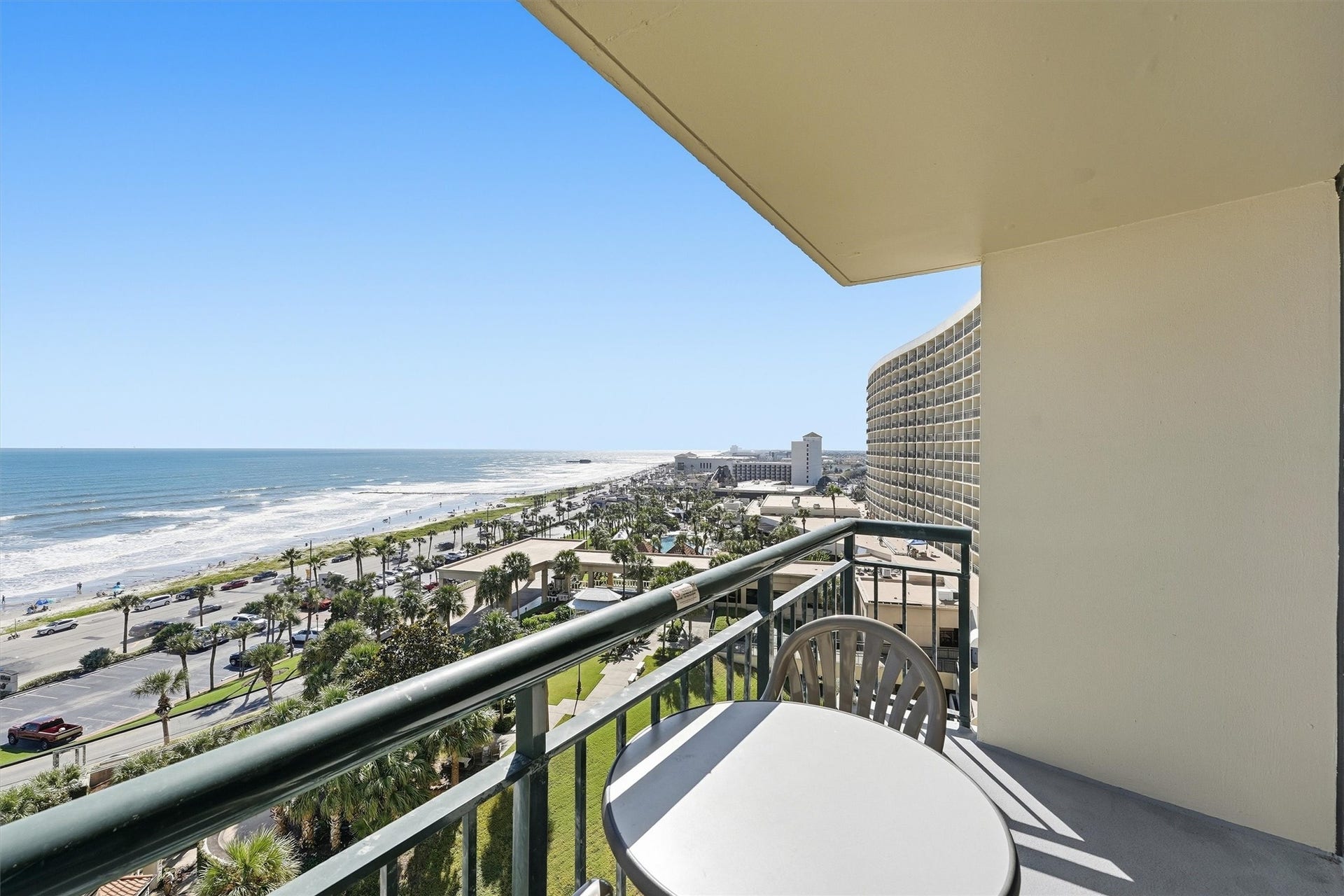 5220 Seawall Boulevard, #1038D, Galveston, TX 77551 Enjoy a shaded outdoor retreat with beautiful views stretching along Galvestons coastline.