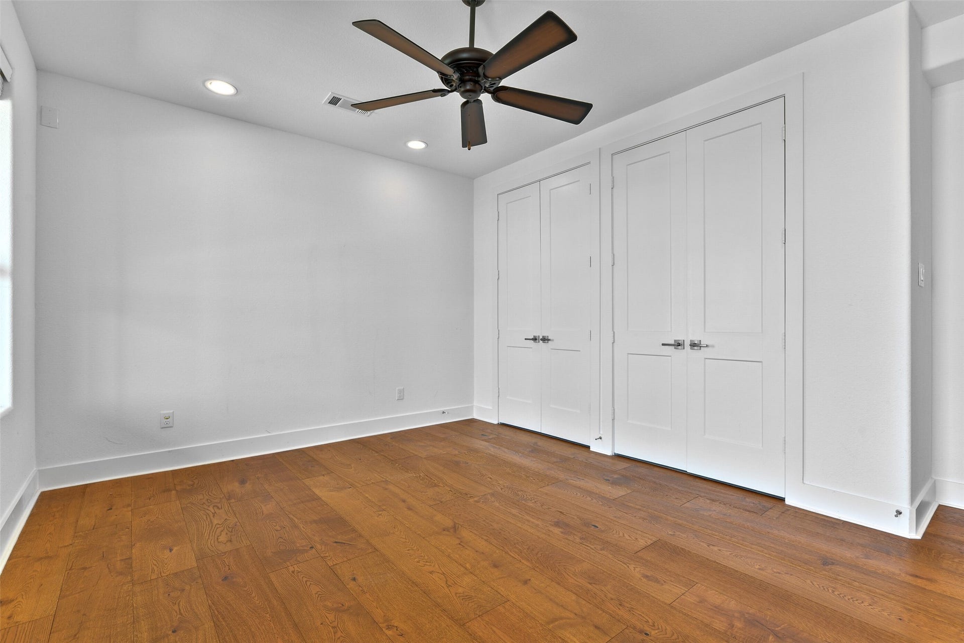 4006 Fort Bend Drive, Galveston, TX 77554 The beautiful hardwood floors continue through to the priamry bedroom.