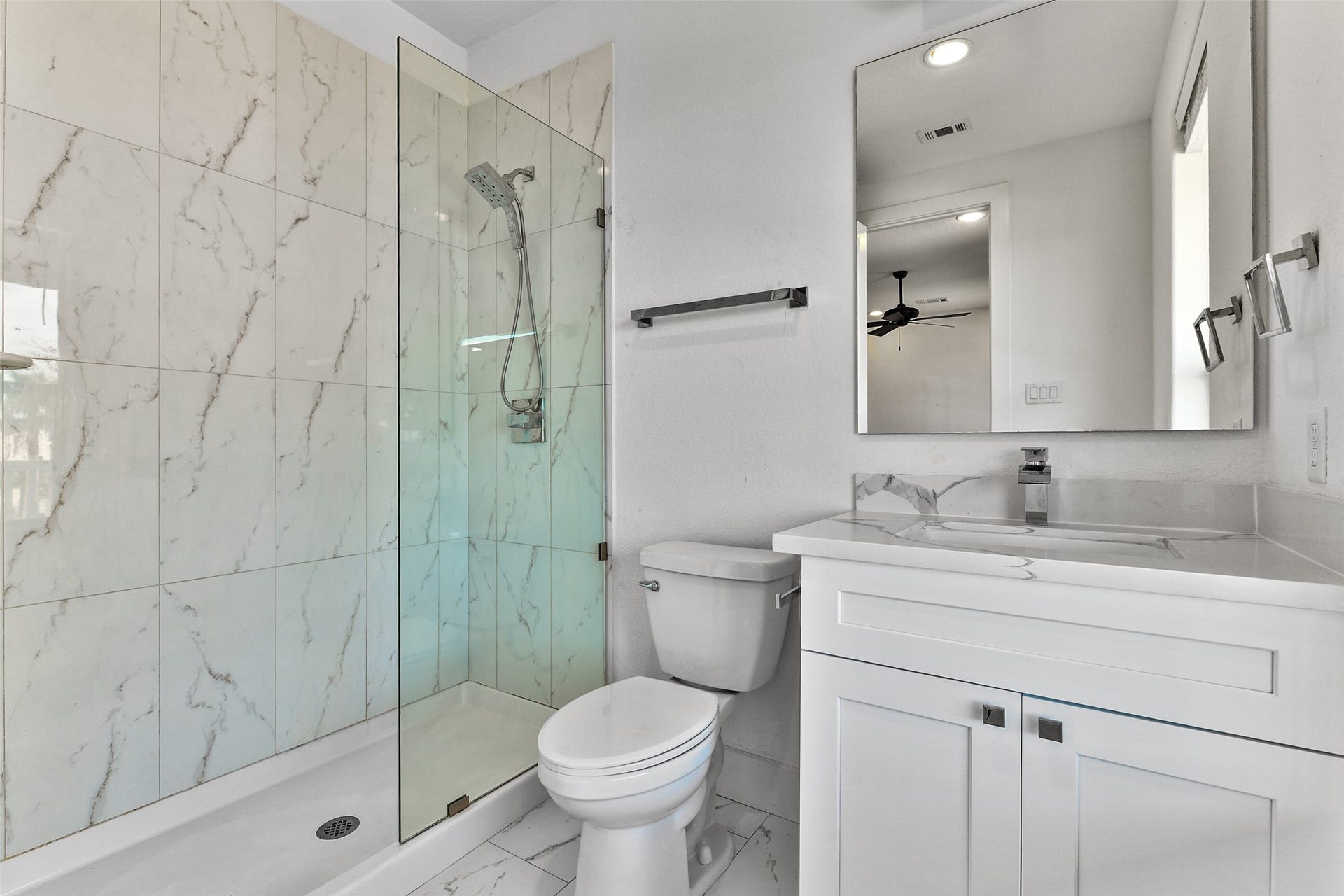 4006 Fort Bend Drive, Galveston, TX 77554 The spa-like shower is a perfect way to start the day.
