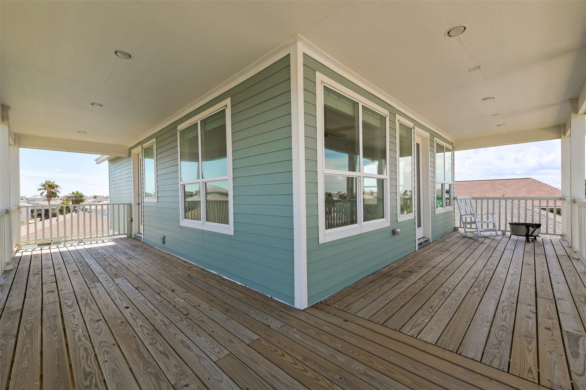 4006 Fort Bend Drive, Galveston, TX 77554 The second level has both South and East facing decks from the living room, and 4th bedroom.