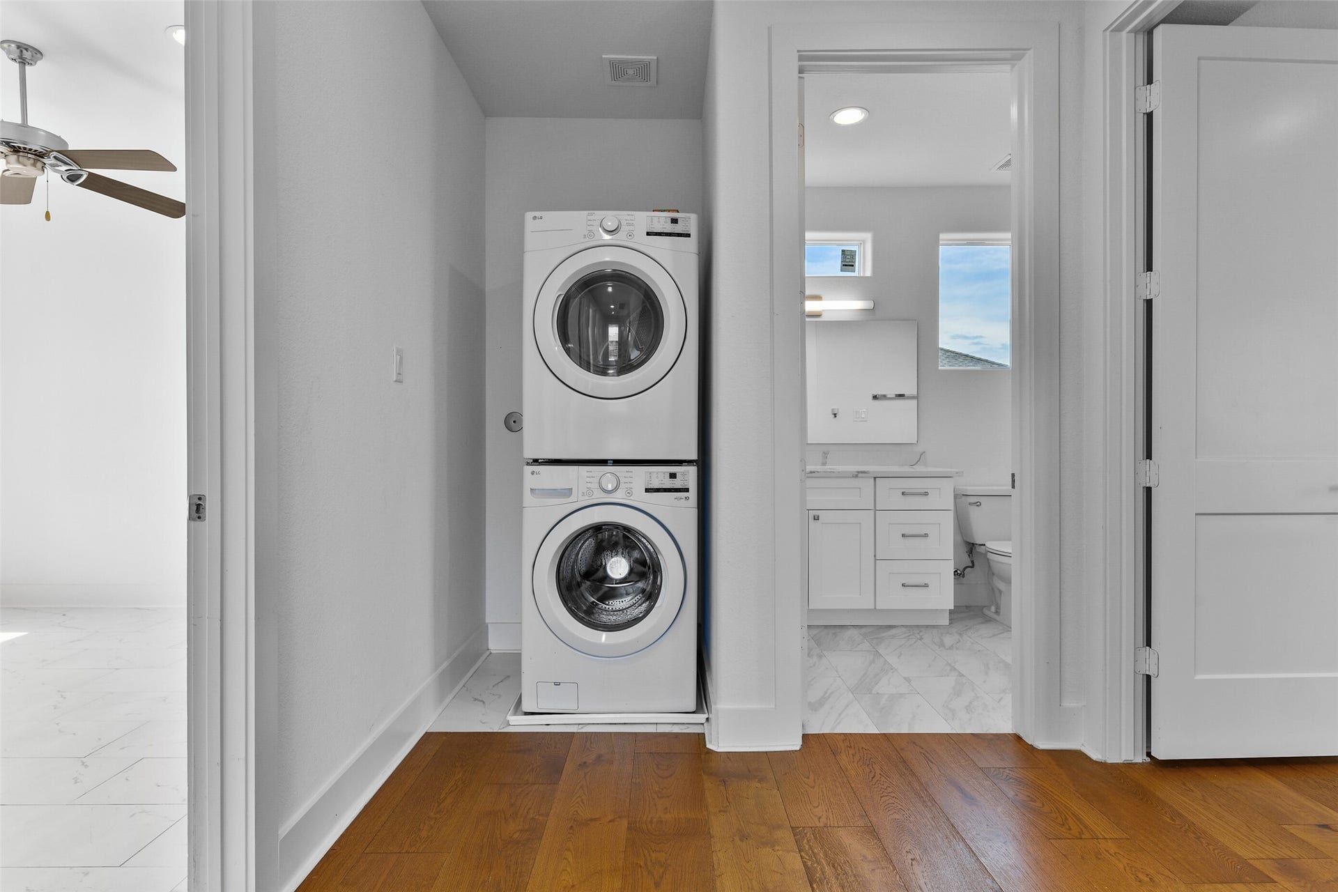 4006 Fort Bend Drive, Galveston, TX 77554 The laundry is located conveniently between all three bedrooms.