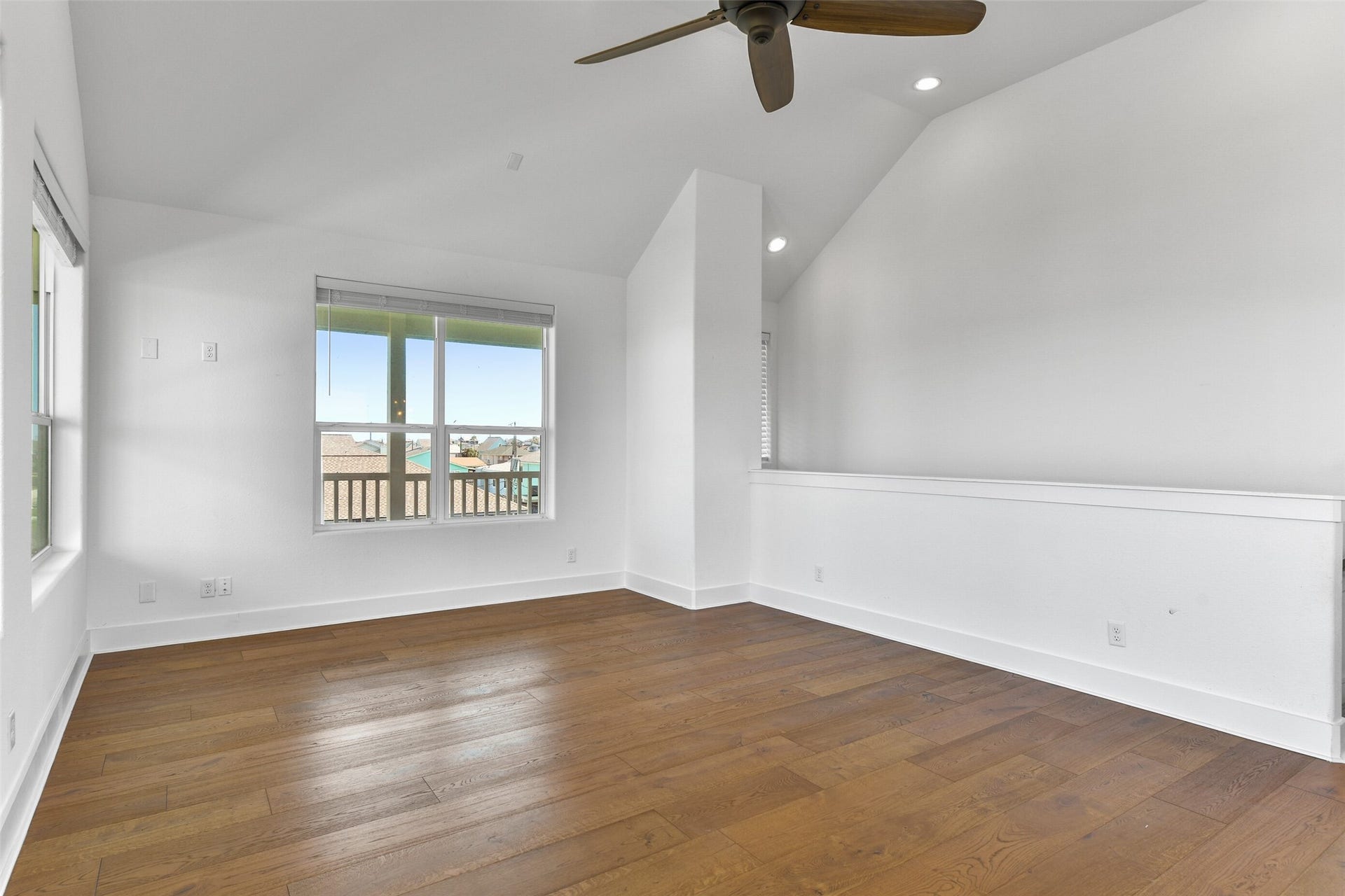 4006 Fort Bend Drive, Galveston, TX 77554 The living room is bright and airy, and has incredible ceilings.
