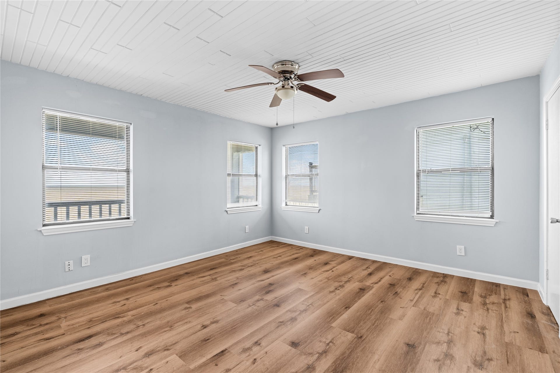 645 3rd Street, San Leon, TX 77539 Designed with simplicity in mind, the bathroom features a large glass-enclosed shower, an expansive vanity, and an airy layout that feels both fresh and functional.