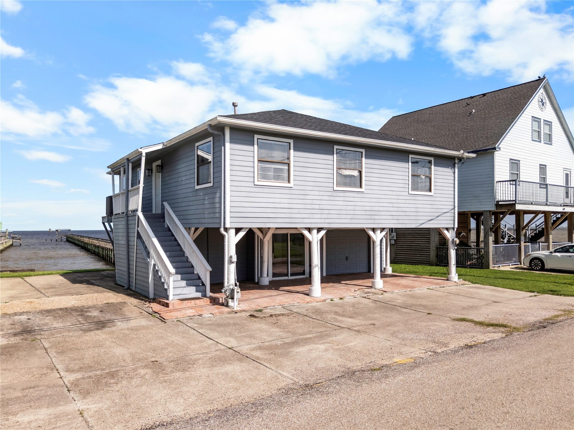 645 3rd Street, San Leon, TX 77539 Just steps from the bay, this elevated coastal home pairs timeless waterfront character with the peace of mind of raised construction and uninterrupted coastal views.