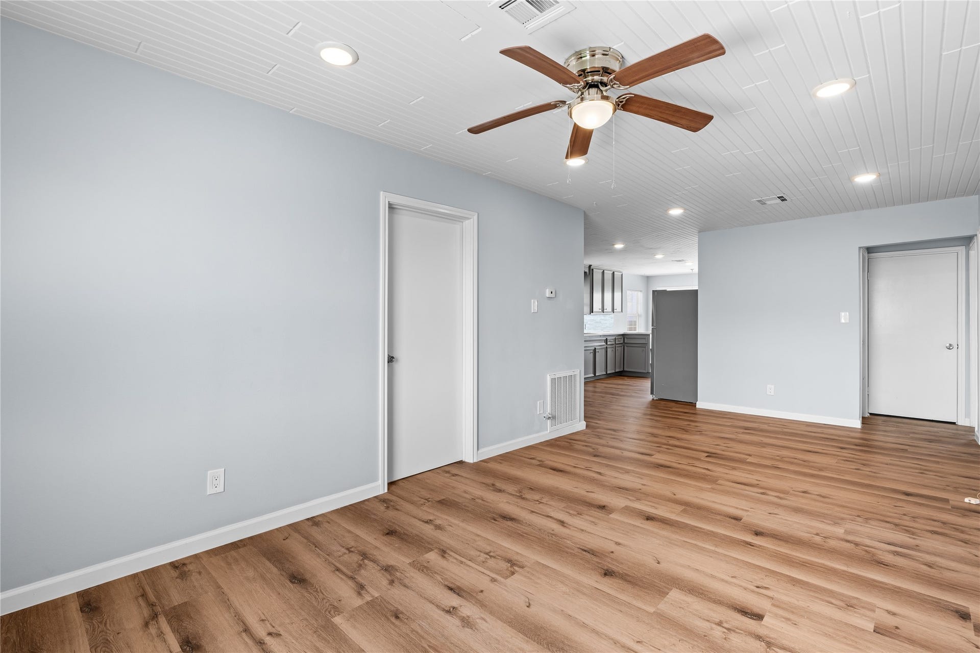 645 3rd Street, San Leon, TX 77539 The spacious primary bedroom offers a peaceful retreat, with room to unwind and a bright, airy atmosphere that complements the home's coastal setting.