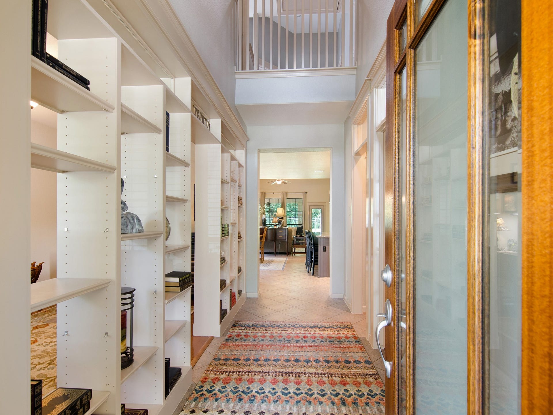 From the moment you open the door, the home's soaring ceilings and thoughtful layout create a sense of openness, elegance and connection between the living spaces.