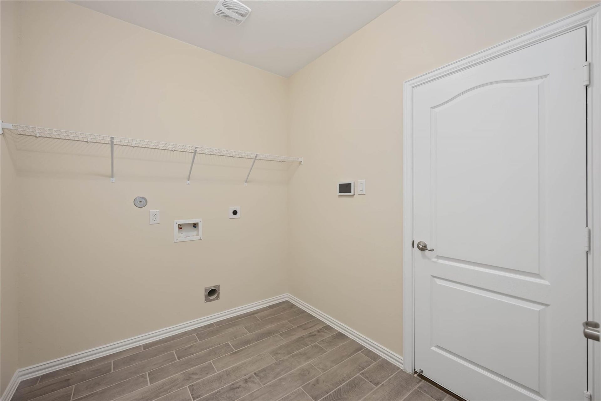 13202 Dancing Reed Drive, Texas City, TX 77568 1st floor laundry room, with storage closet