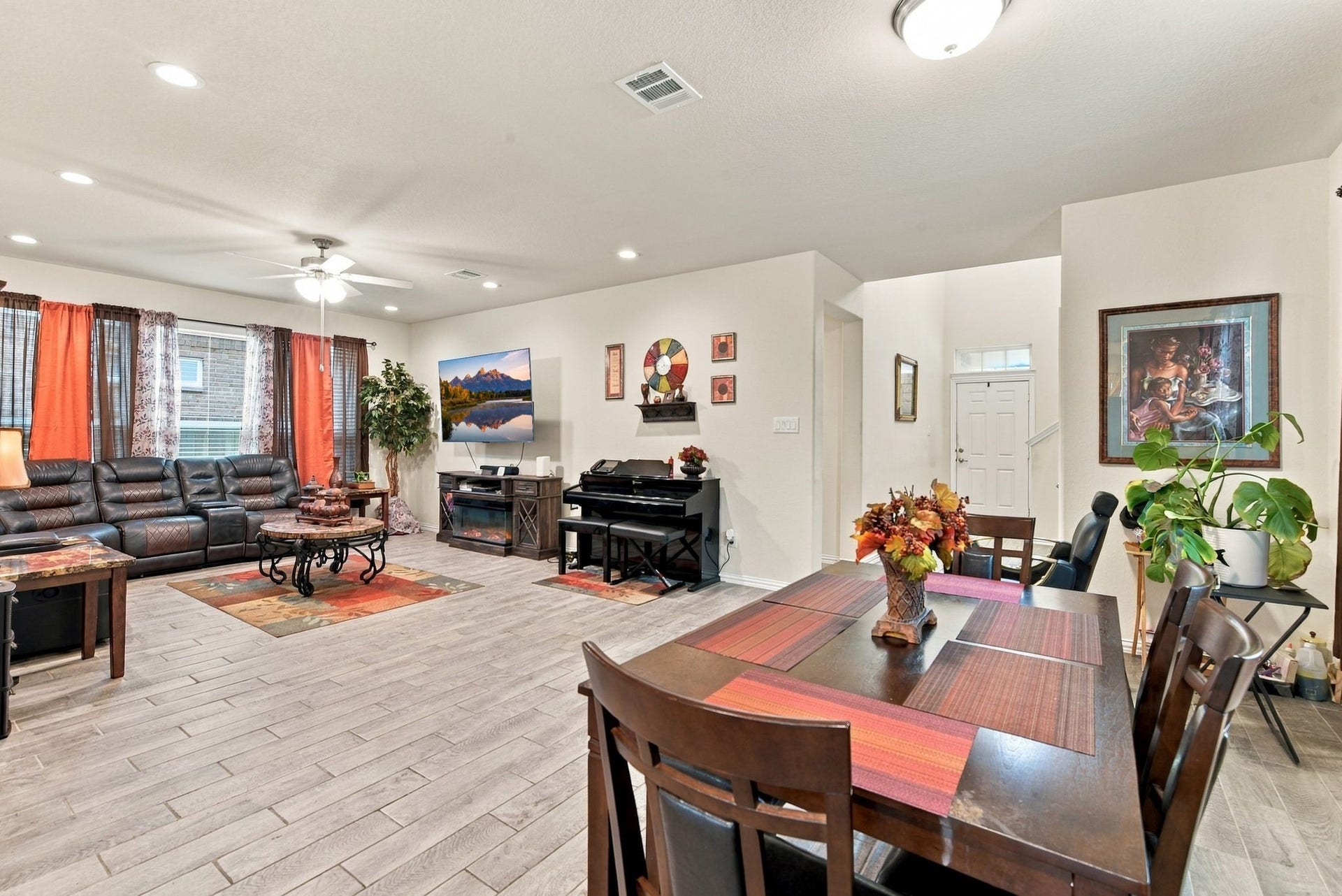 13202 Dancing Reed Drive, Texas City, TX 77568 Open-concept living and dining area featuring modern tile flooring, ample natural light, perfect for entertaining and family gatherings.