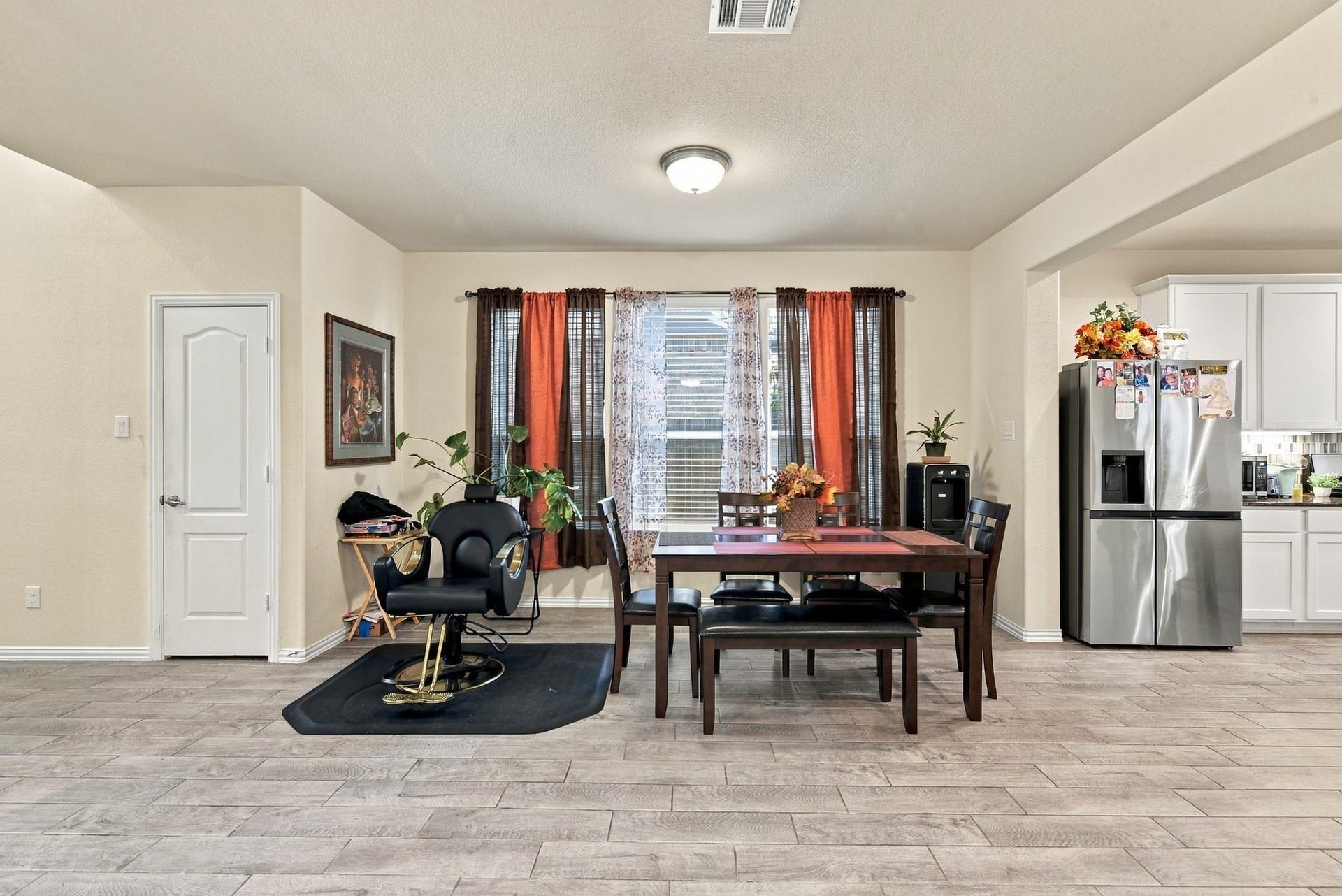 13202 Dancing Reed Drive, Texas City, TX 77568 Bright dining area, large windows for natural light, and an inviting open layout leading to the modern kitchen.