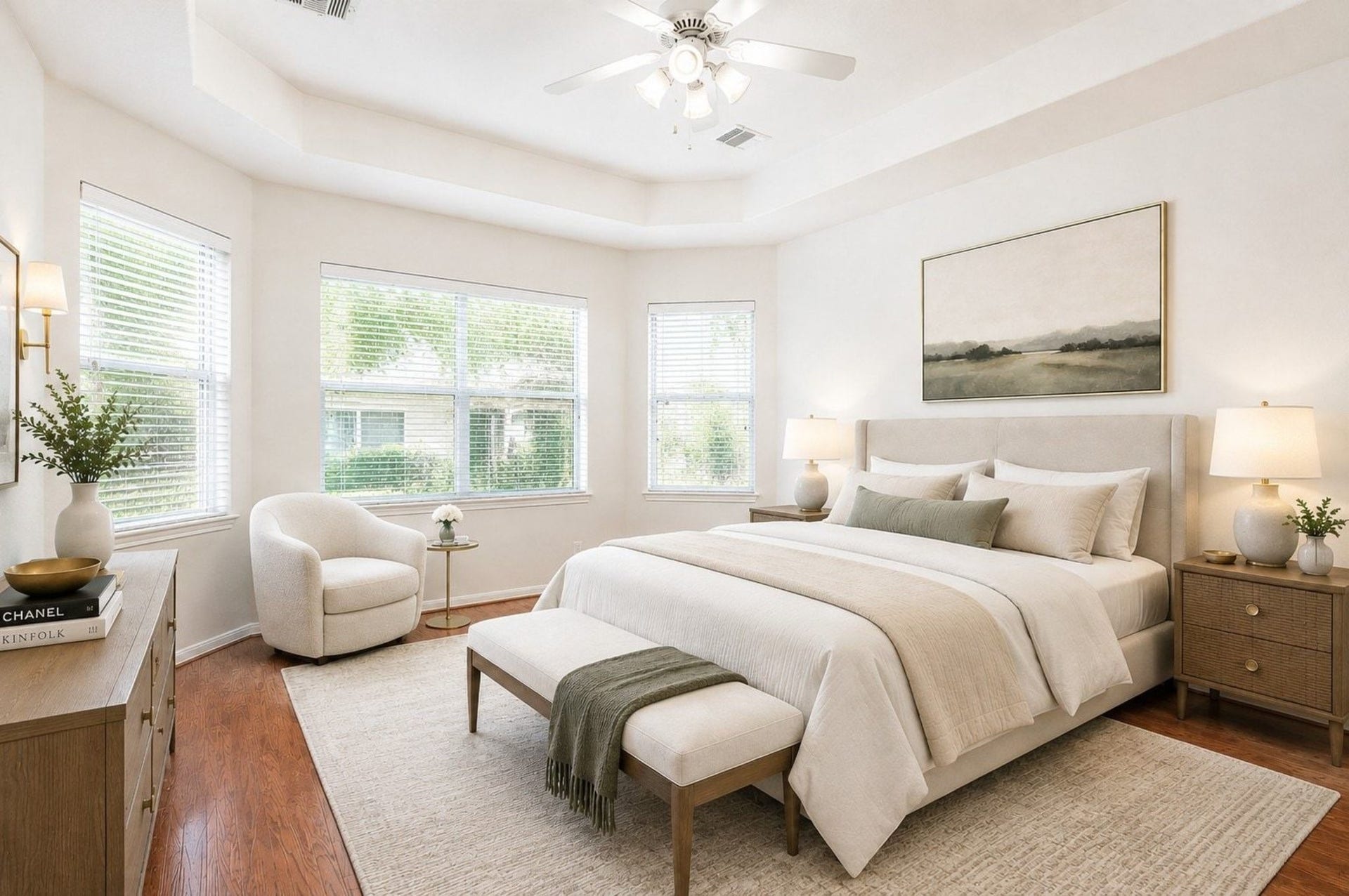 4746 Autumn Orchard Lane, Katy, TX 77494 Experience the elegance of a virtually staged primary room, featuring a grand entrance with a stunning arched window and tray ceiling, welcoming you with warmth and style.