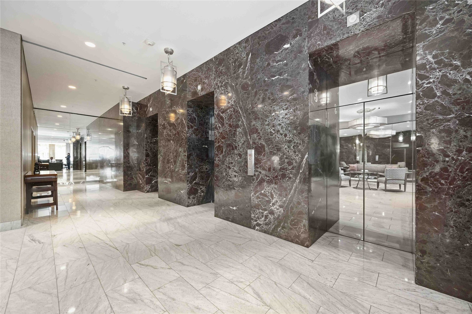 5000 Montrose Boulevard, #6A, Houston, TX 77006 The polished elevator lobby is finished in rich marble for a sophisticated arrival home.