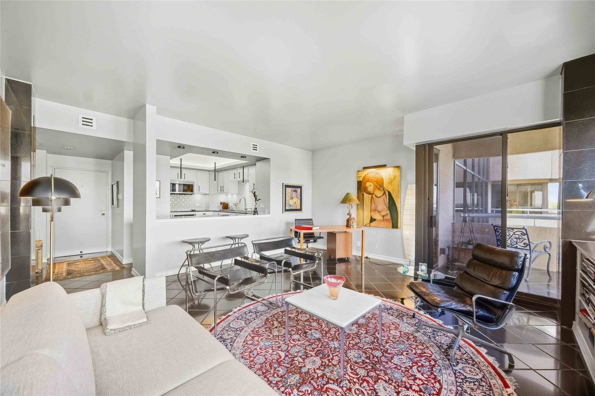 5000 Montrose Boulevard, #6A, Houston, TX 77006 Living and dining areas flow together, so the whole space feels open and easy to live in.