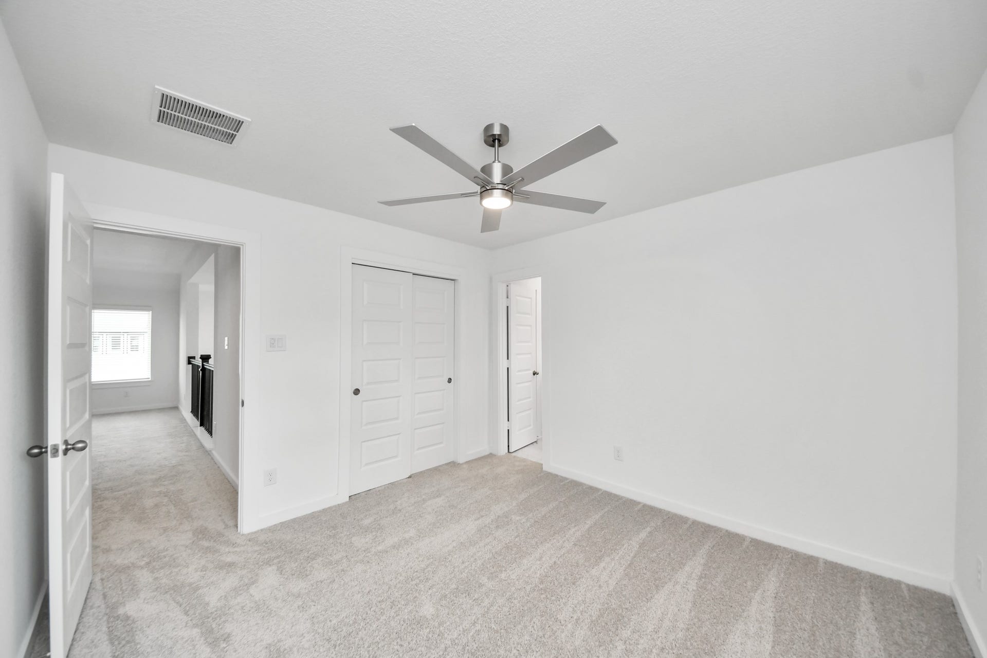 63 Knight Bayou Drive, Dayton, TX 77535 Generously sized secondary bedrooms featuring spacious closets, soft and inviting carpeting underfoot, large windows allowing plenty of natural light, and the added touch of privacy blinds for your personal retreat. Sample photo of completed home with similar floor plan. Actual colors and selections may vary.