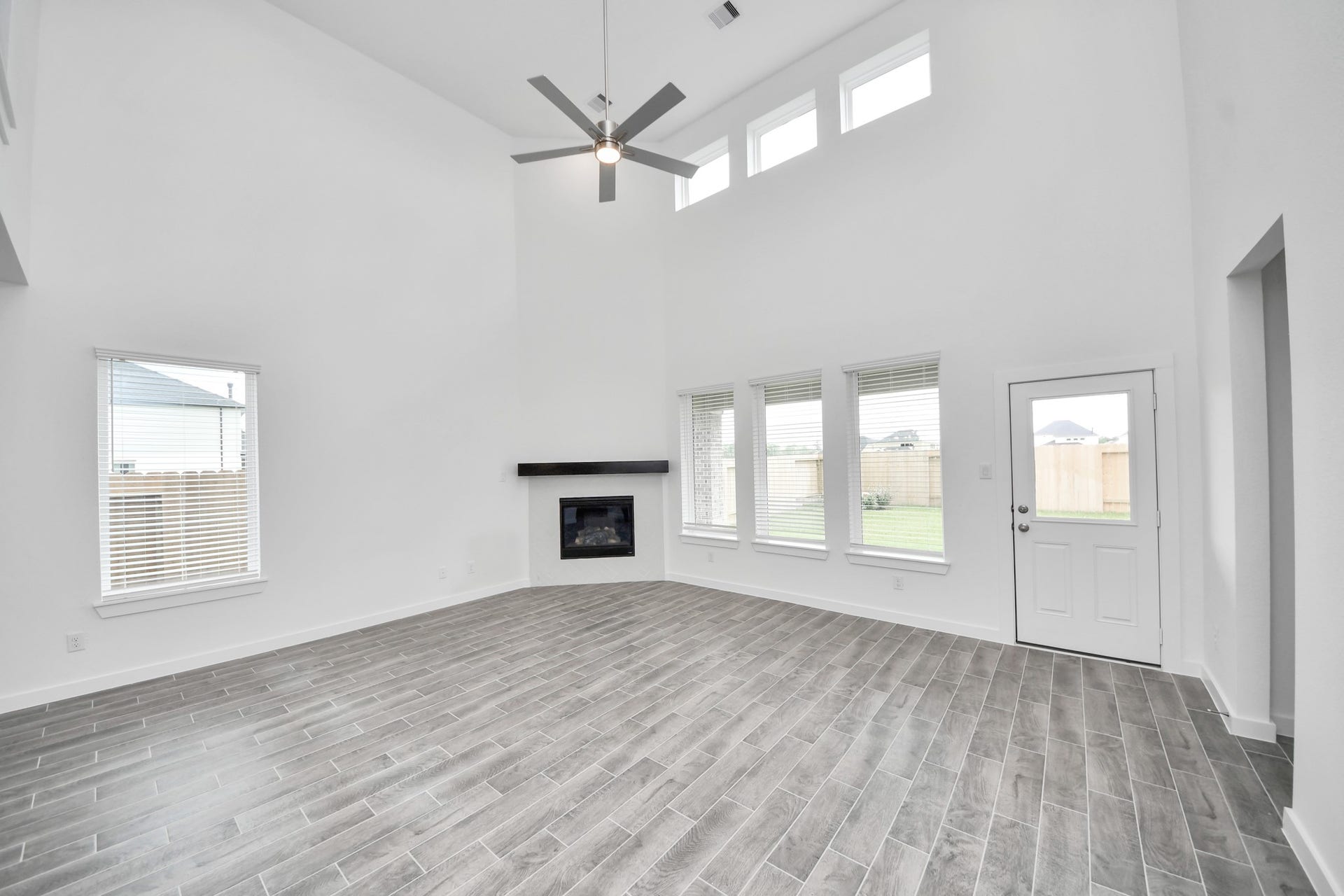 63 Knight Bayou Drive, Dayton, TX 77535 Take another glimpse into the heart of the home with this additional view of the family rooma sprawling space ready to accommodate all your gatherings. Sample photo of completed home with similar floor plan. Actual colors and selections may vary.