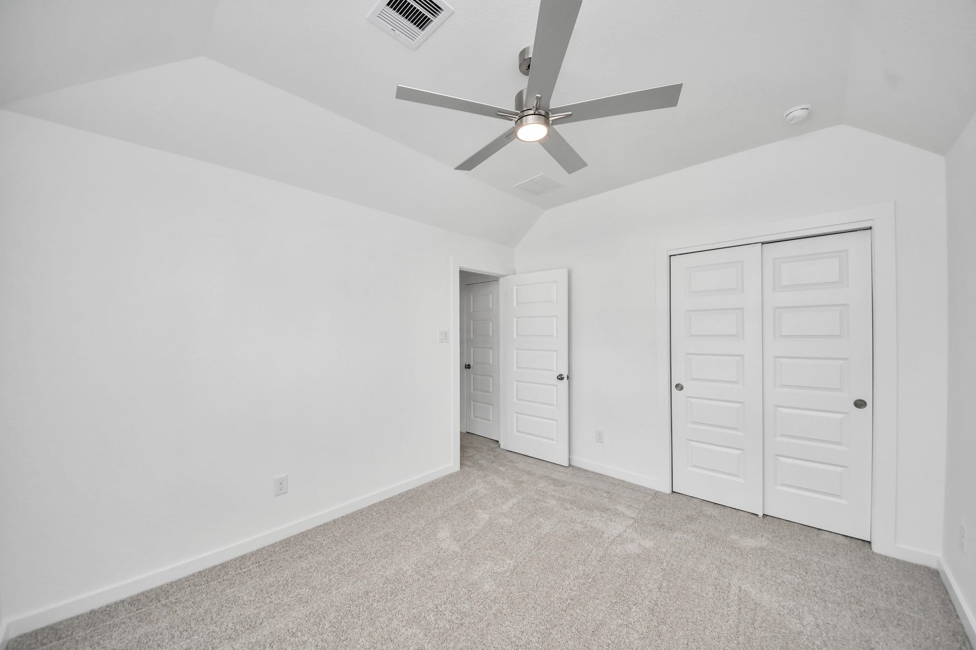 63 Knight Bayou Drive, Dayton, TX 77535 Generously sized secondary bedrooms featuring spacious closets, soft and inviting carpeting underfoot, large windows allowing plenty of natural light, and the added touch of privacy blinds for your personal retreat. Sample photo of completed home with similar floor plan. Actual colors and selections may vary.