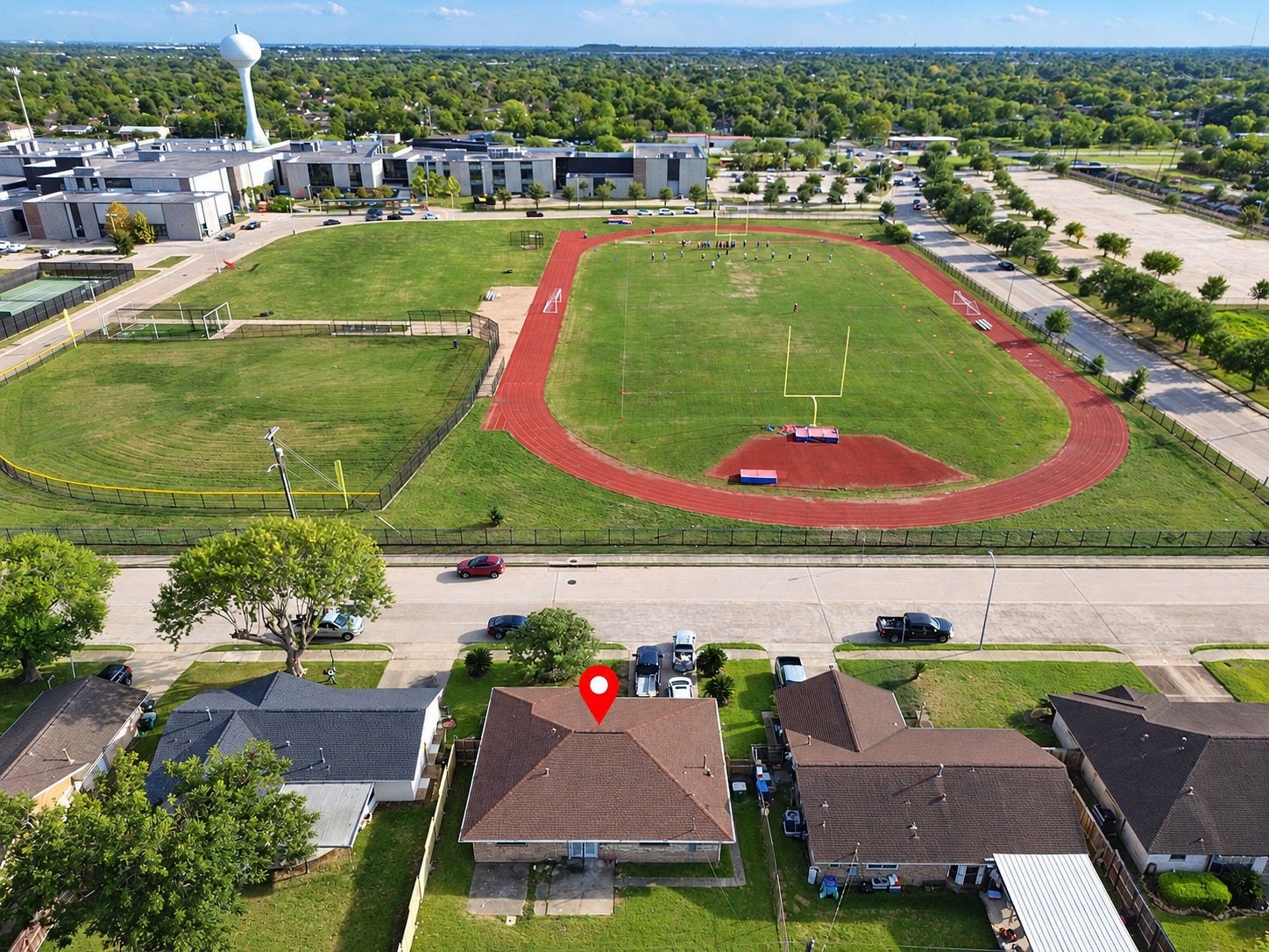 3914 Beran Drive, Houston, TX 77045 A drone shot over the home showing the distance from James Madison High School!