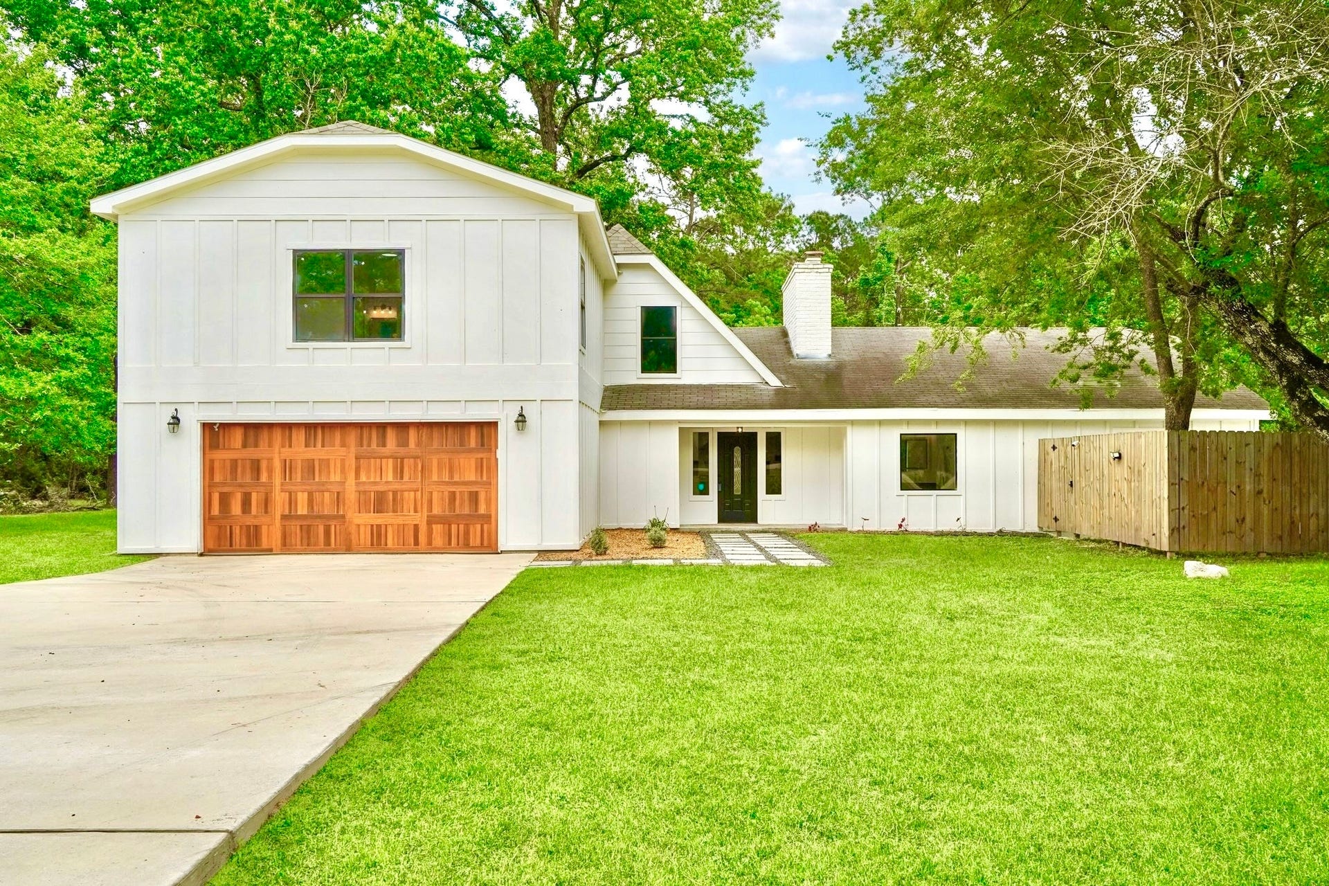 32606 Glenda Drive, Magnolia, TX 77354 Front of Home w/ Double-Driveway & Oversized Garage