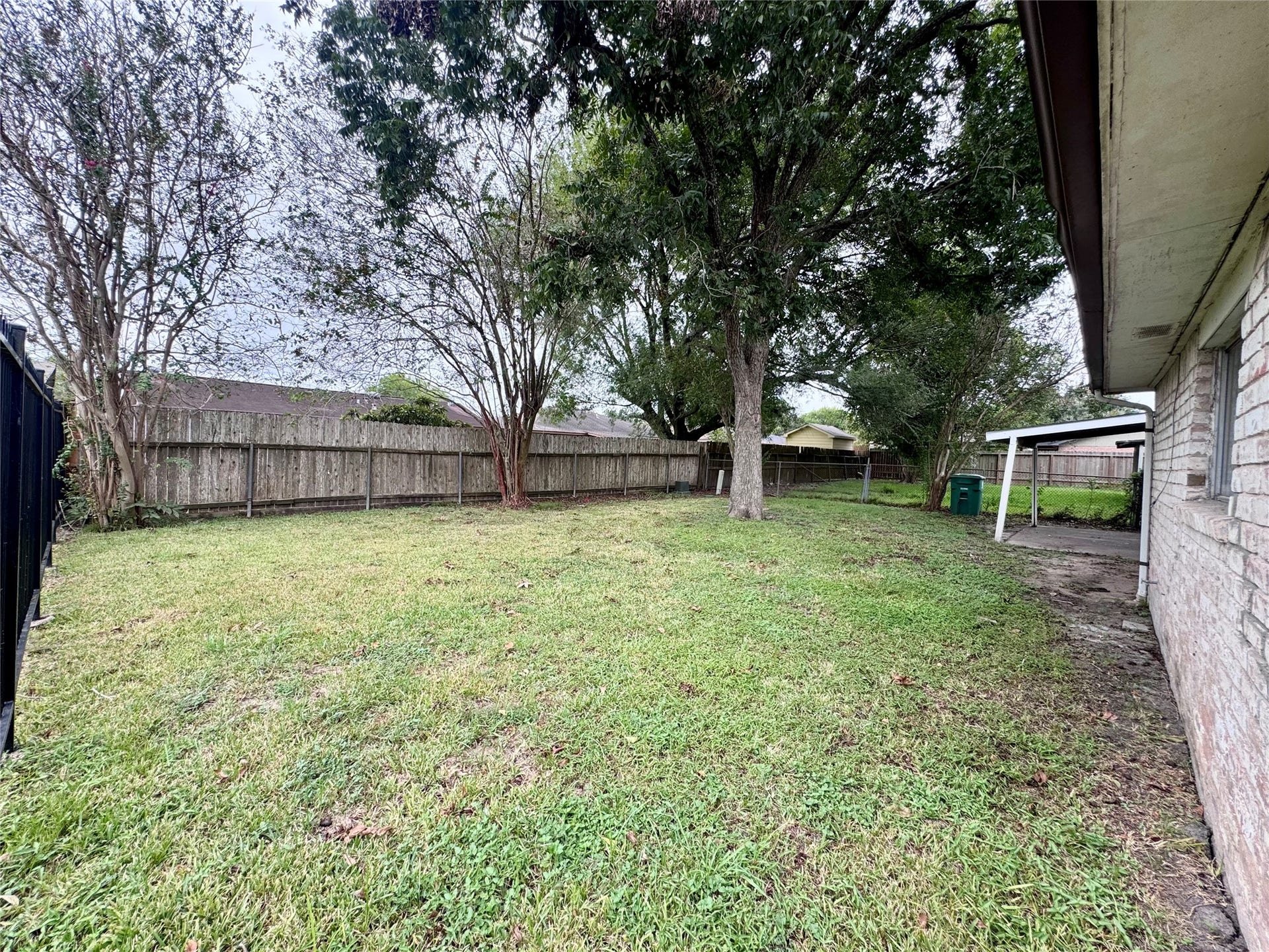 Home has a large backyard with pecan trees that provide plenty of shade.