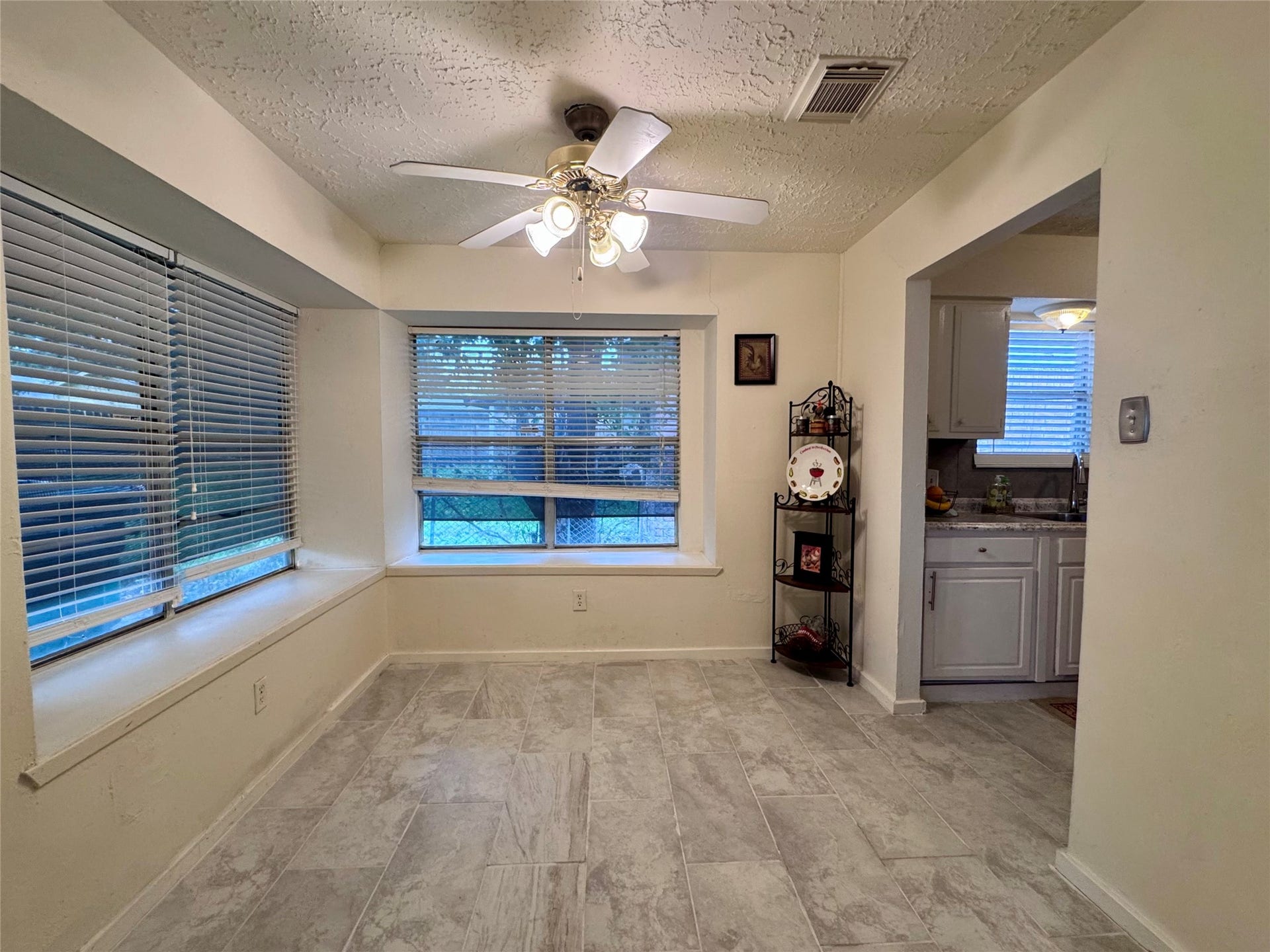 The living room flows nicely into the separate dining area.